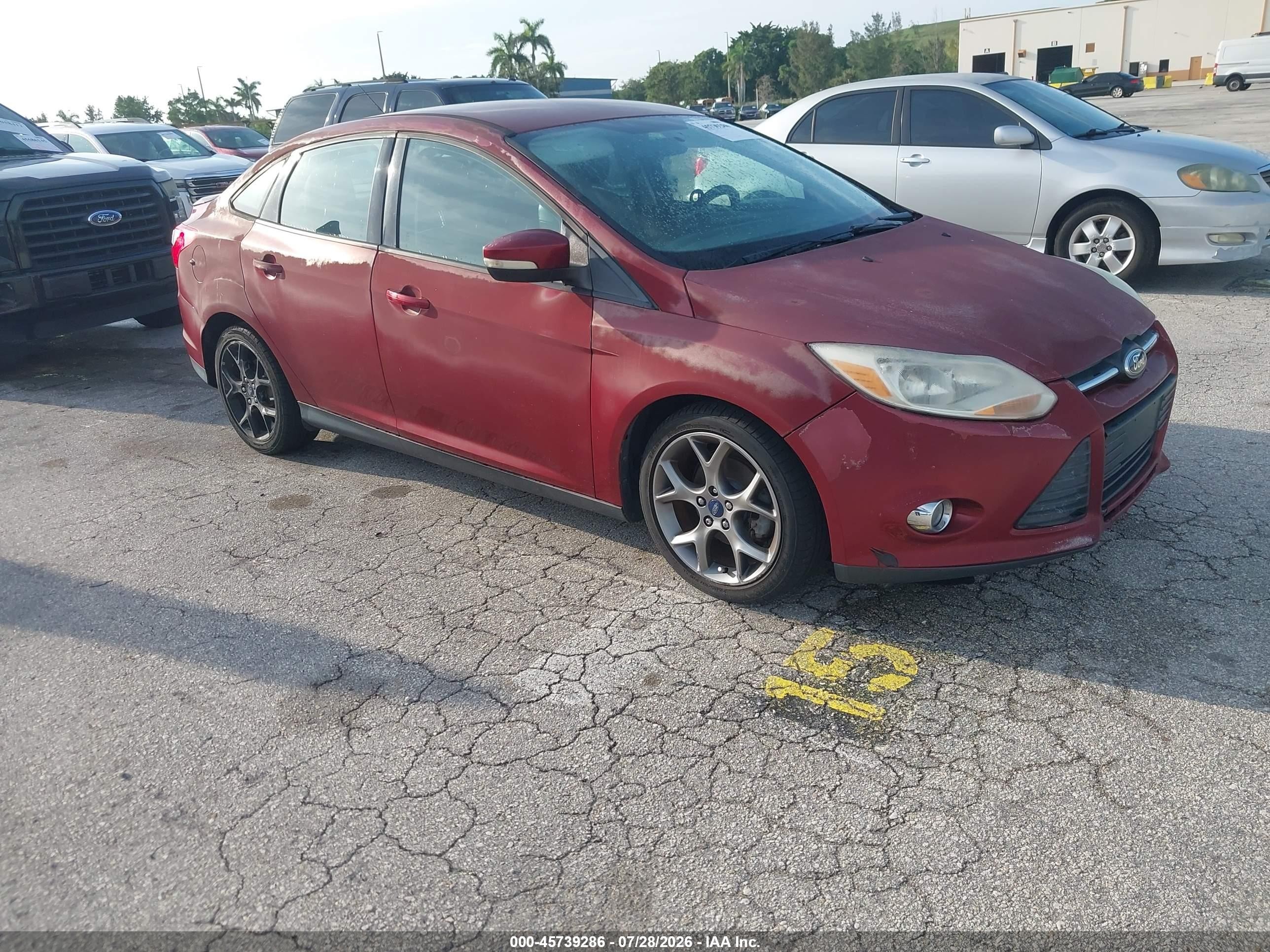 2014 Ford Focus SE, VIN 1FADP3F28EL331055 — Normal wear