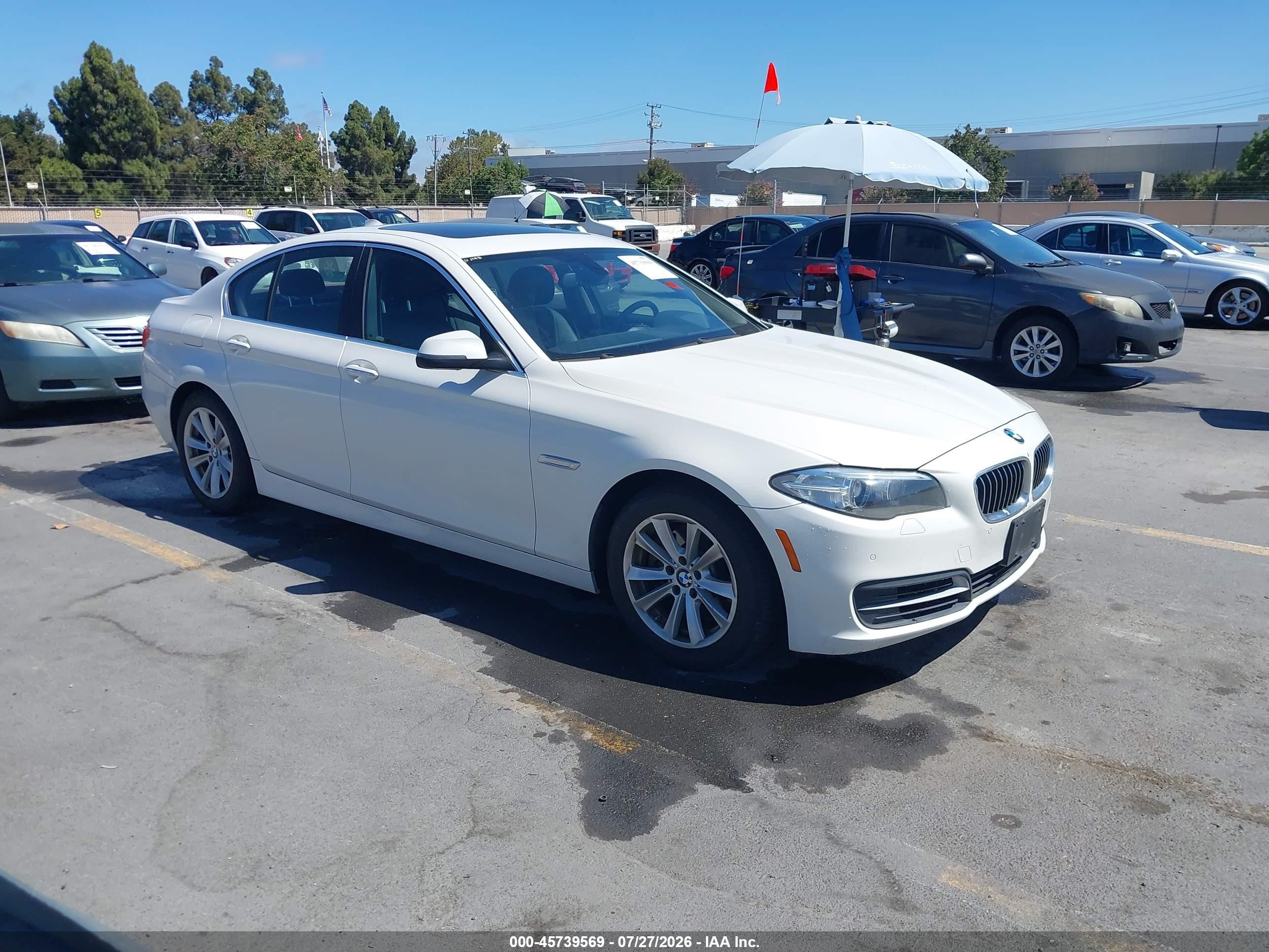 2014 BMW 5 Series 528i, VIN WBA5A5C52ED501749 — Normal wear