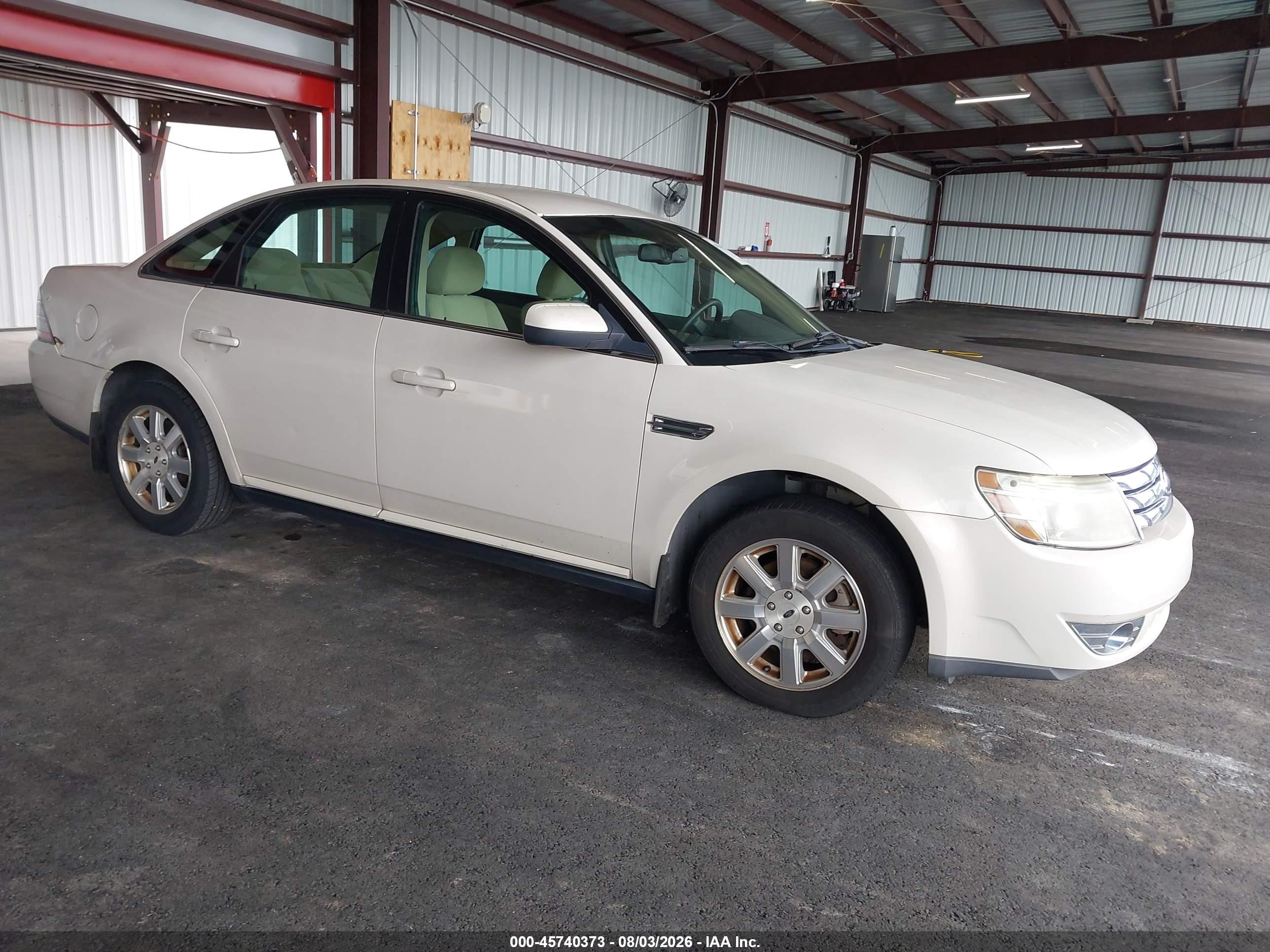 2009 Ford Taurus SE, VIN 1FAHP23W99G104779 — Normal wear