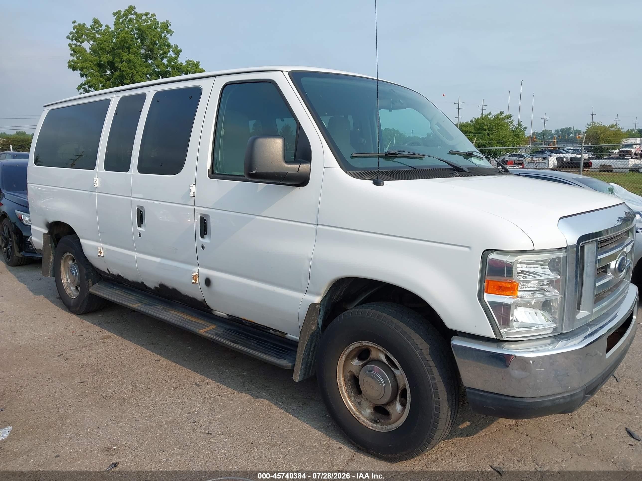 2012 Ford Econoline Passenger XLT, VIN 1FMNE1BW4CDA08626 — Normal wear