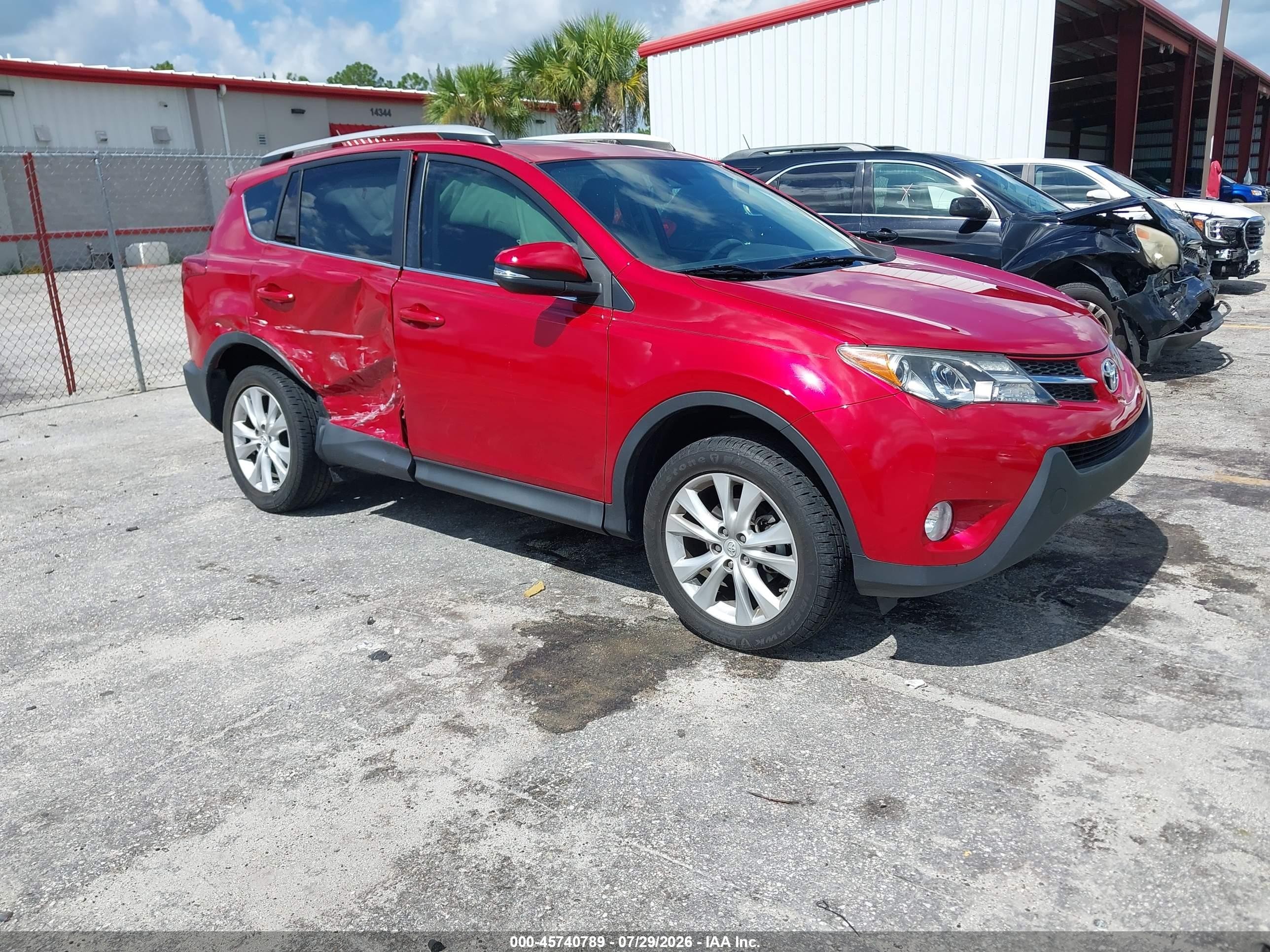 2015 Toyota RAV4 Limited, VIN 2T3YFREVXFW165987 — Side