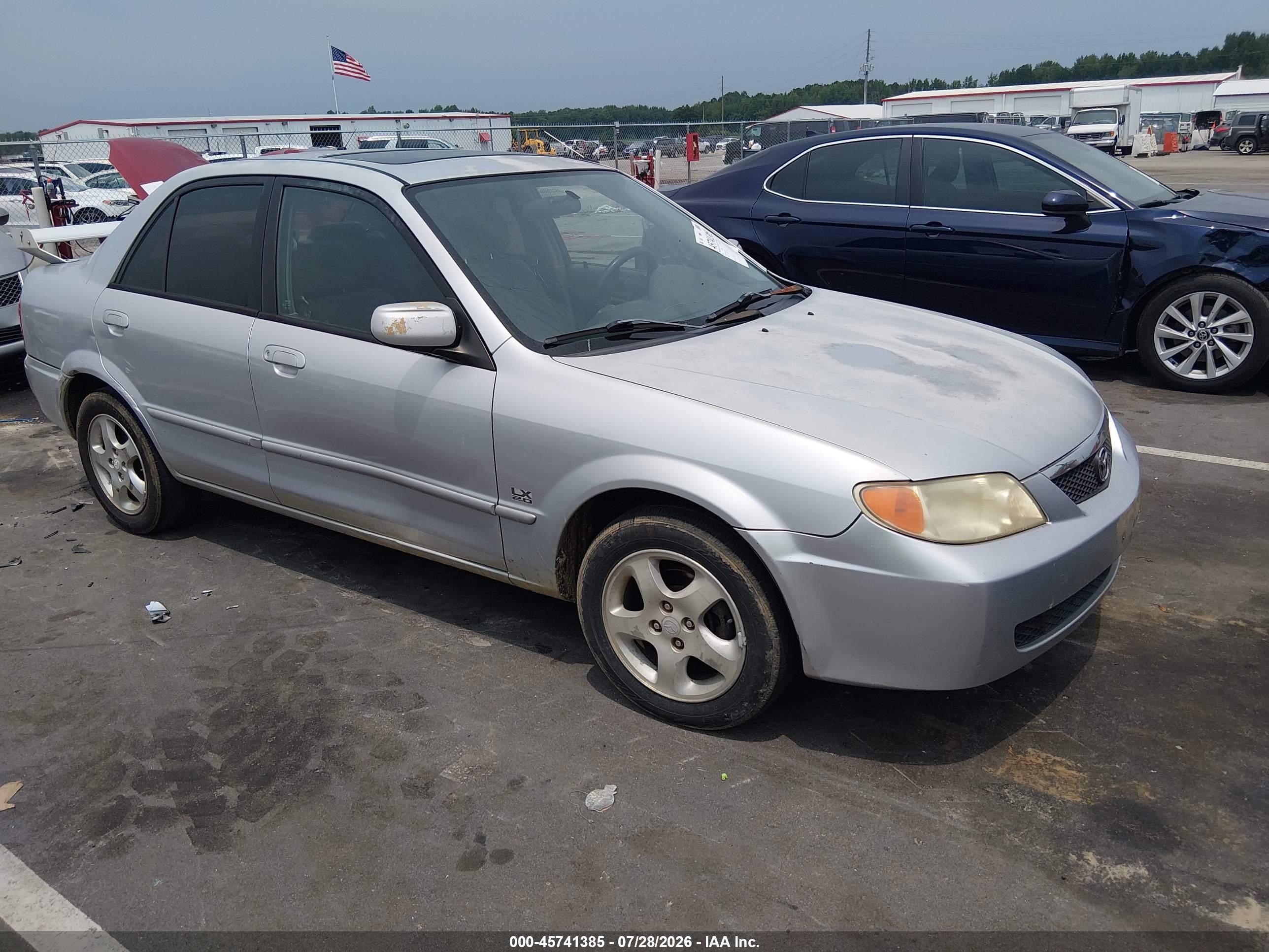 2001 Mazda Protege LX, VIN JM1BJ225410476781 — Зад