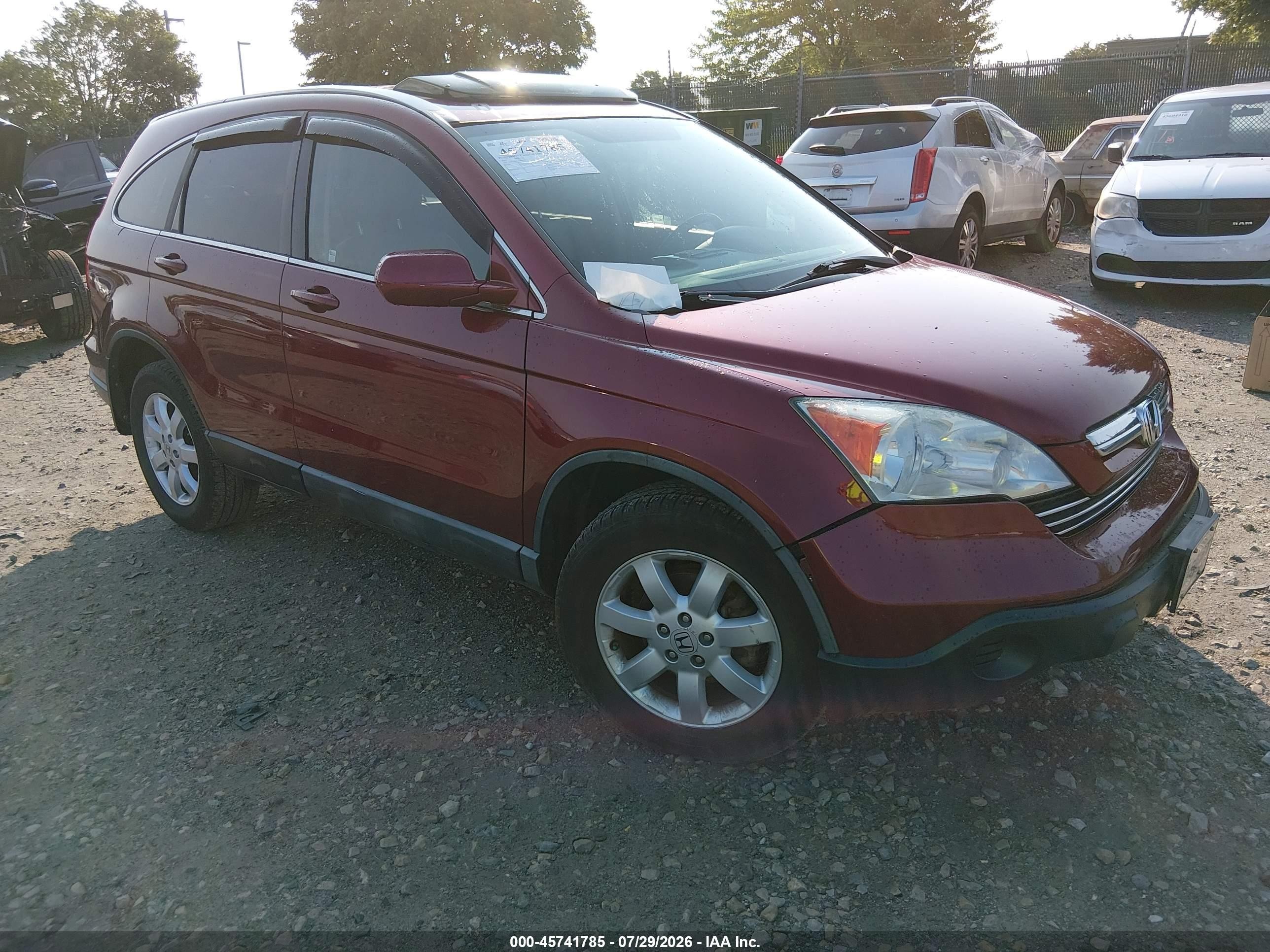 2009 Honda CR-V EX-L, VIN 5J6RE48779L024898 — Side