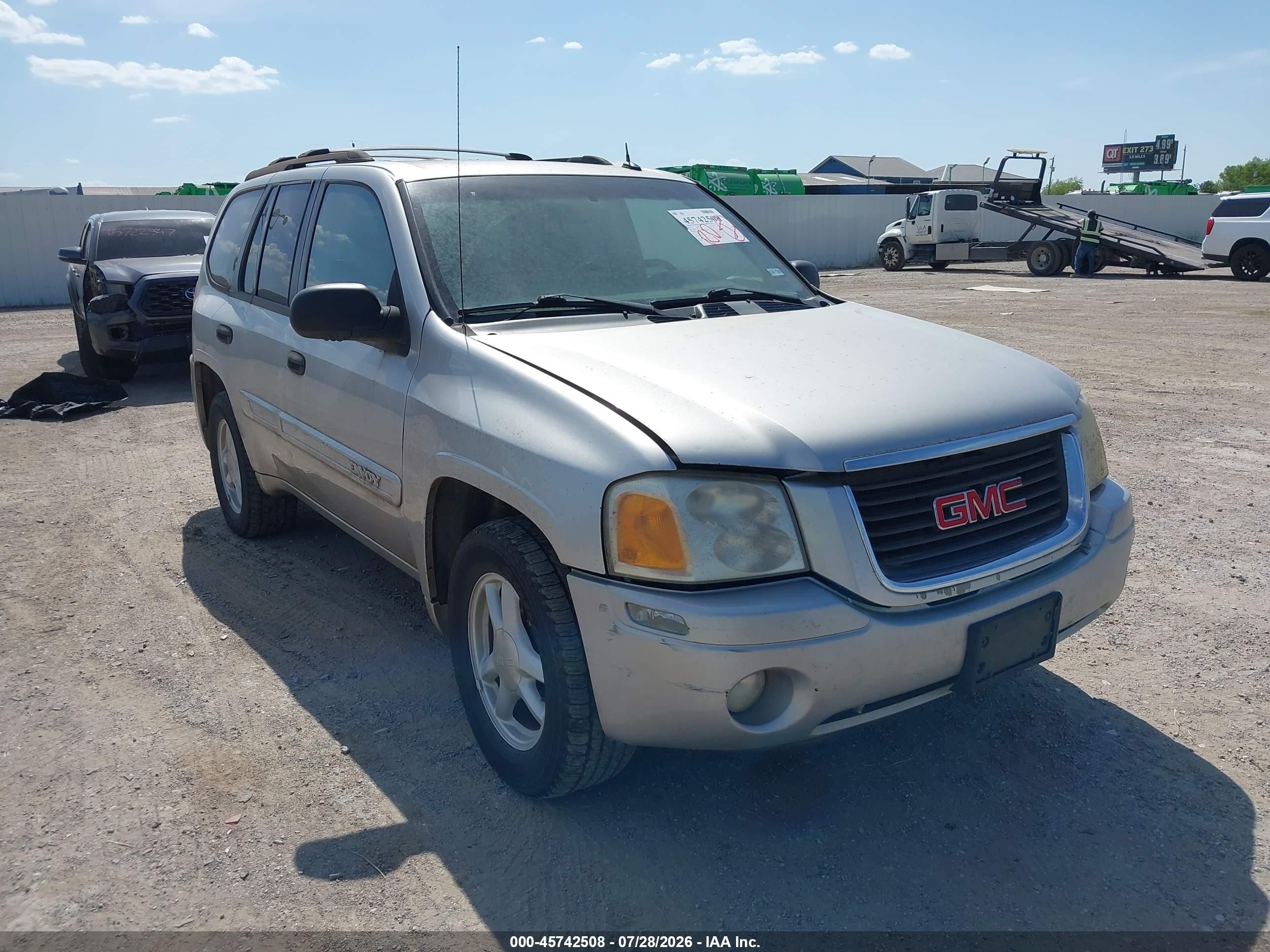 2004 GMC Envoy SLE, VIN 1GKDS13SX42134575 — Normal wear