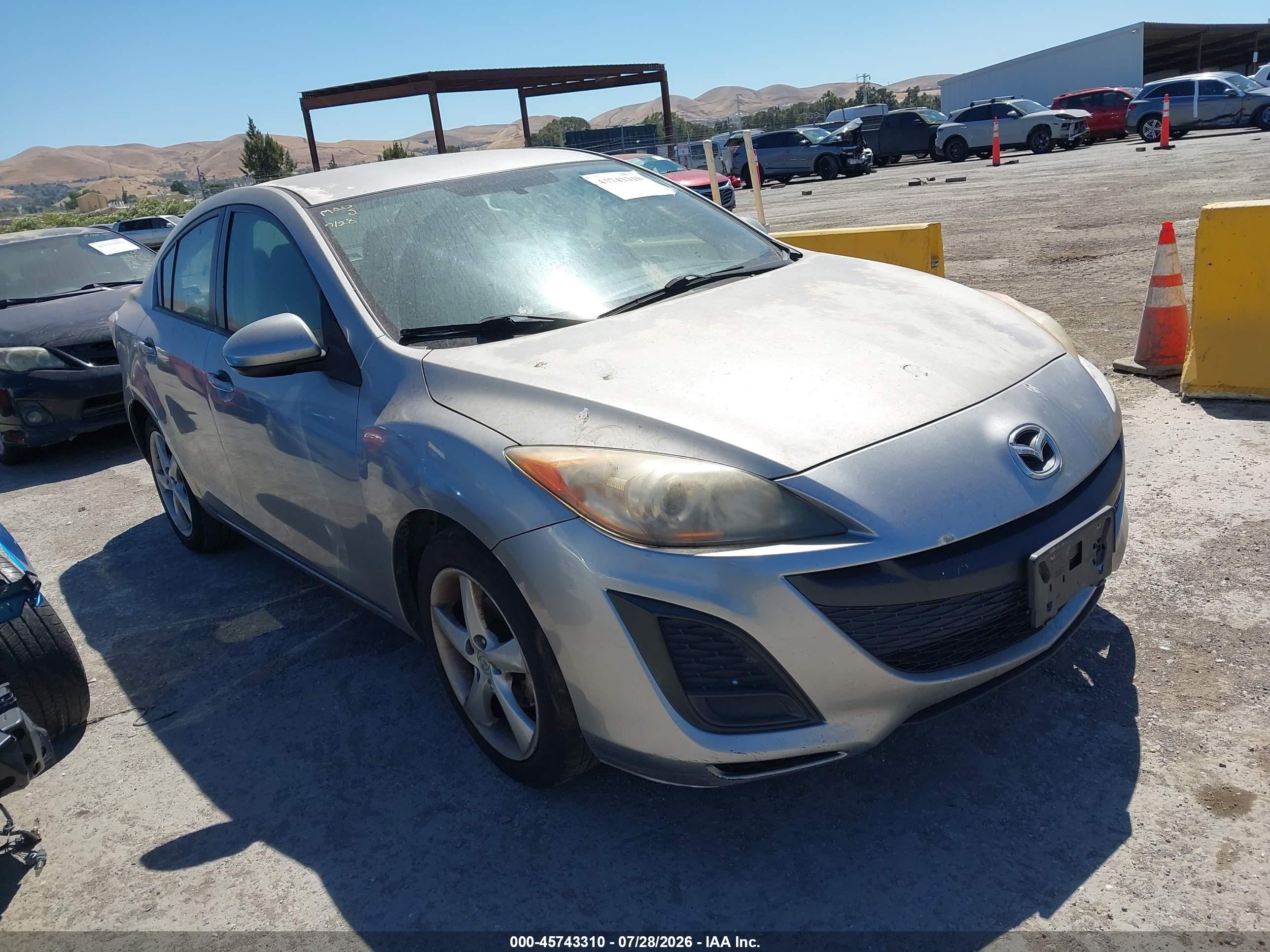 2010 Mazda 3 i Touring, VIN JM1BL1SG8A1261324 — Normal wear