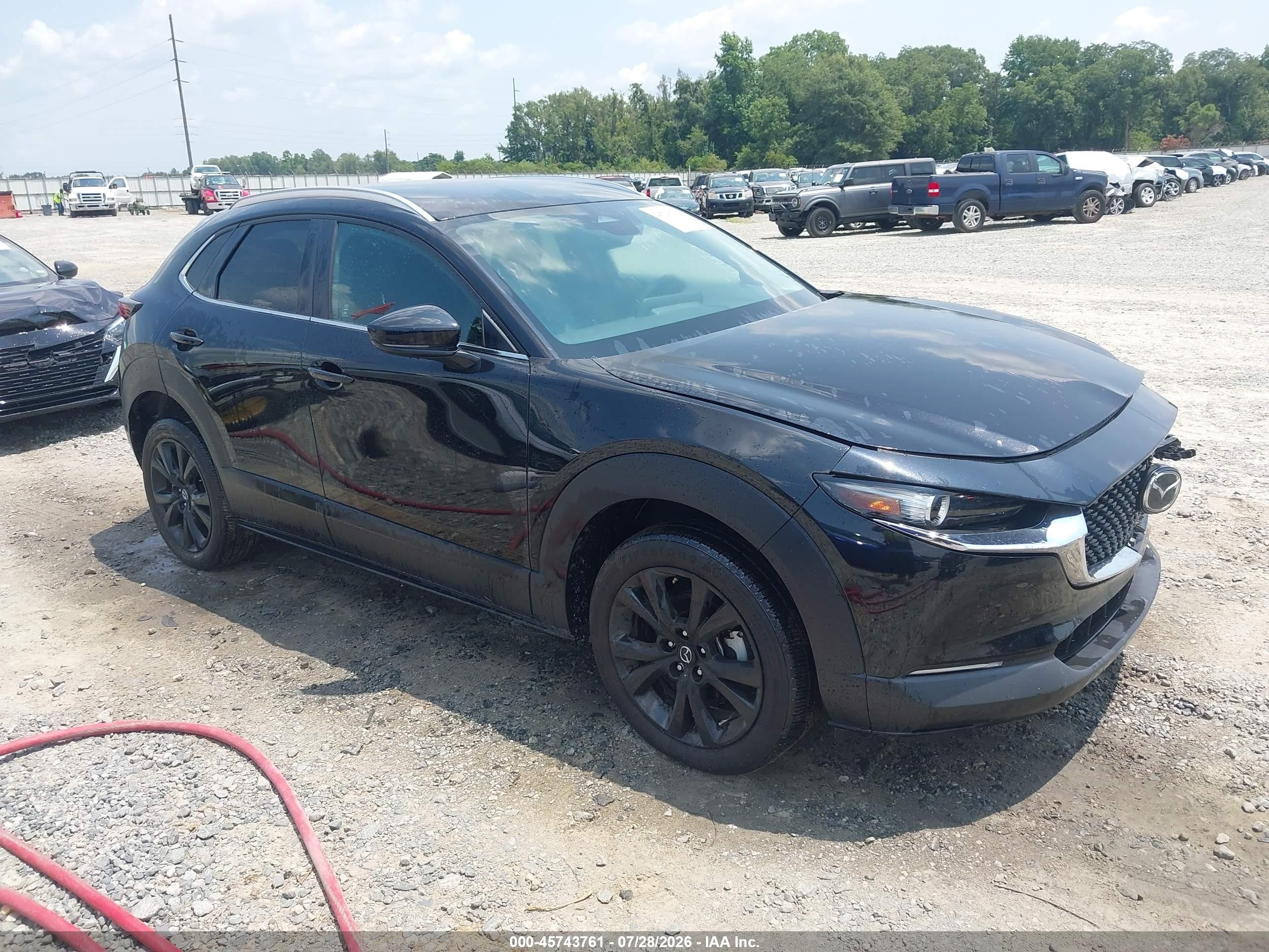 2024 Mazda CX-30 S Select Sport, VIN 3MVDMBBM3RM699876 — Front end