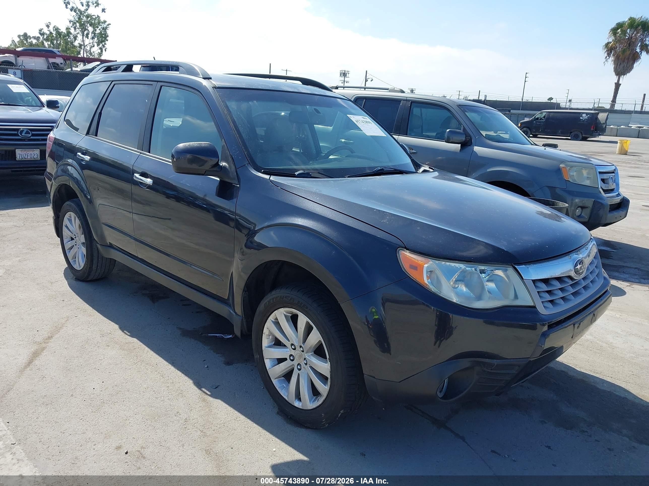 2011 Subaru Forester X Limited, VIN JF2SHAEC6BH709645 — Normal wear