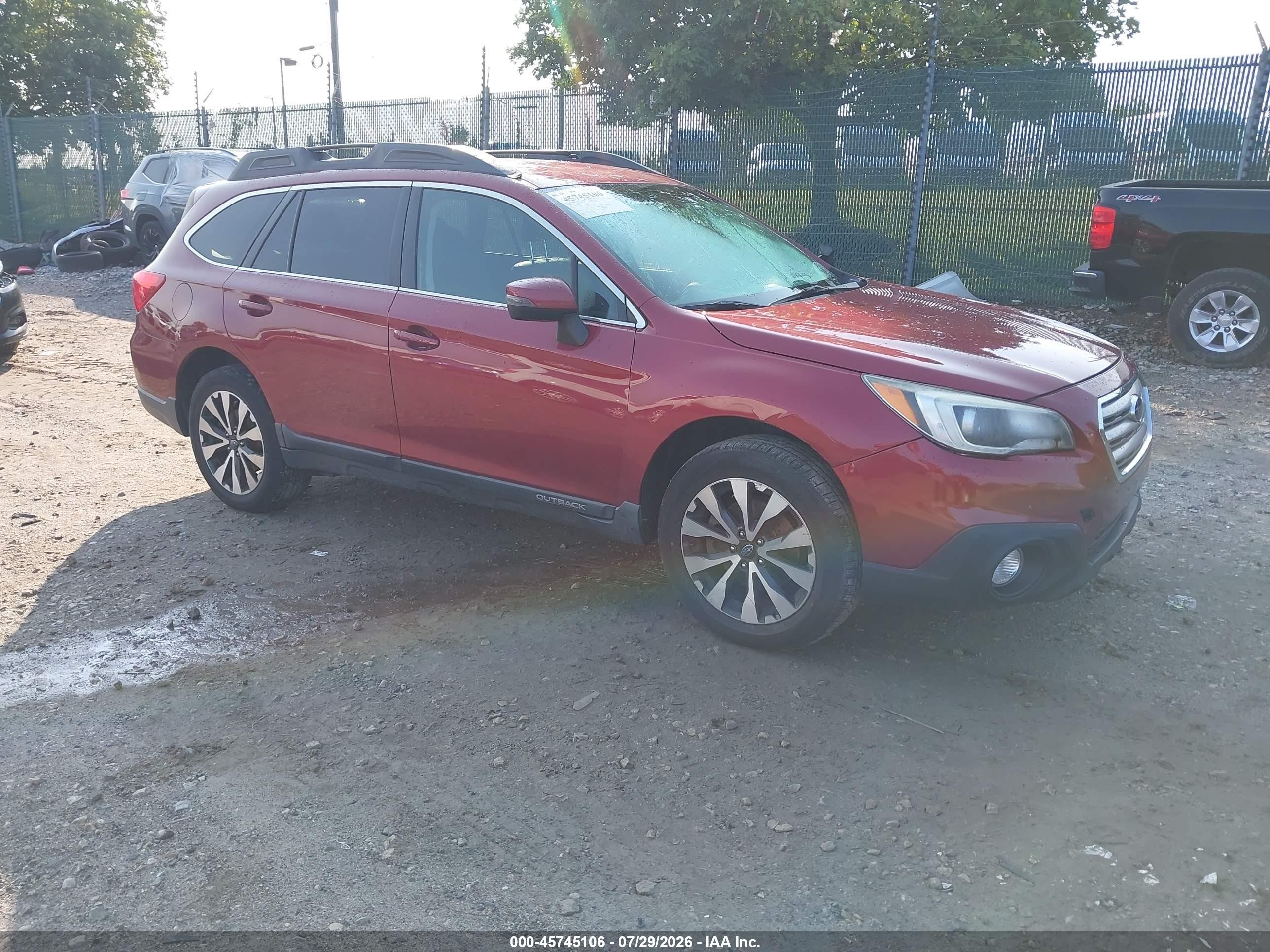 2015 Subaru Outback Limited, VIN 4S4BSAJC4F3314142 — Side