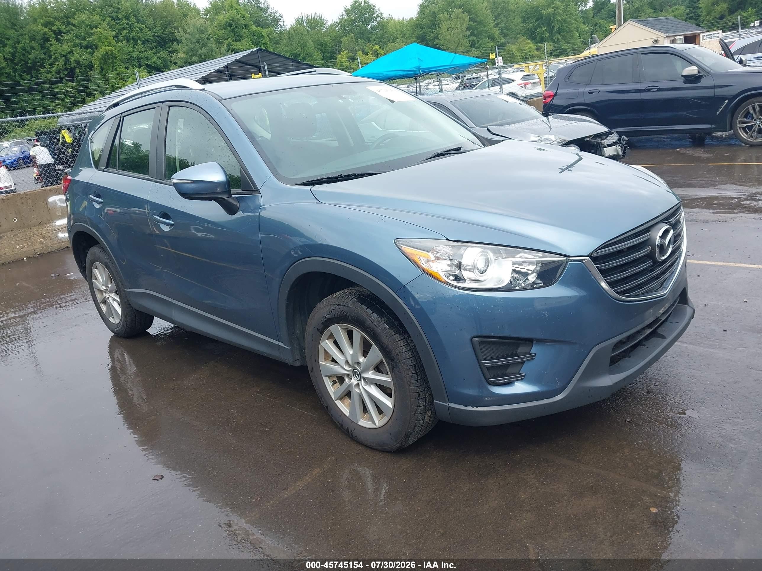2016 Mazda CX-5 Sport, VIN JM3KE4BY5G0769227 — Normal wear