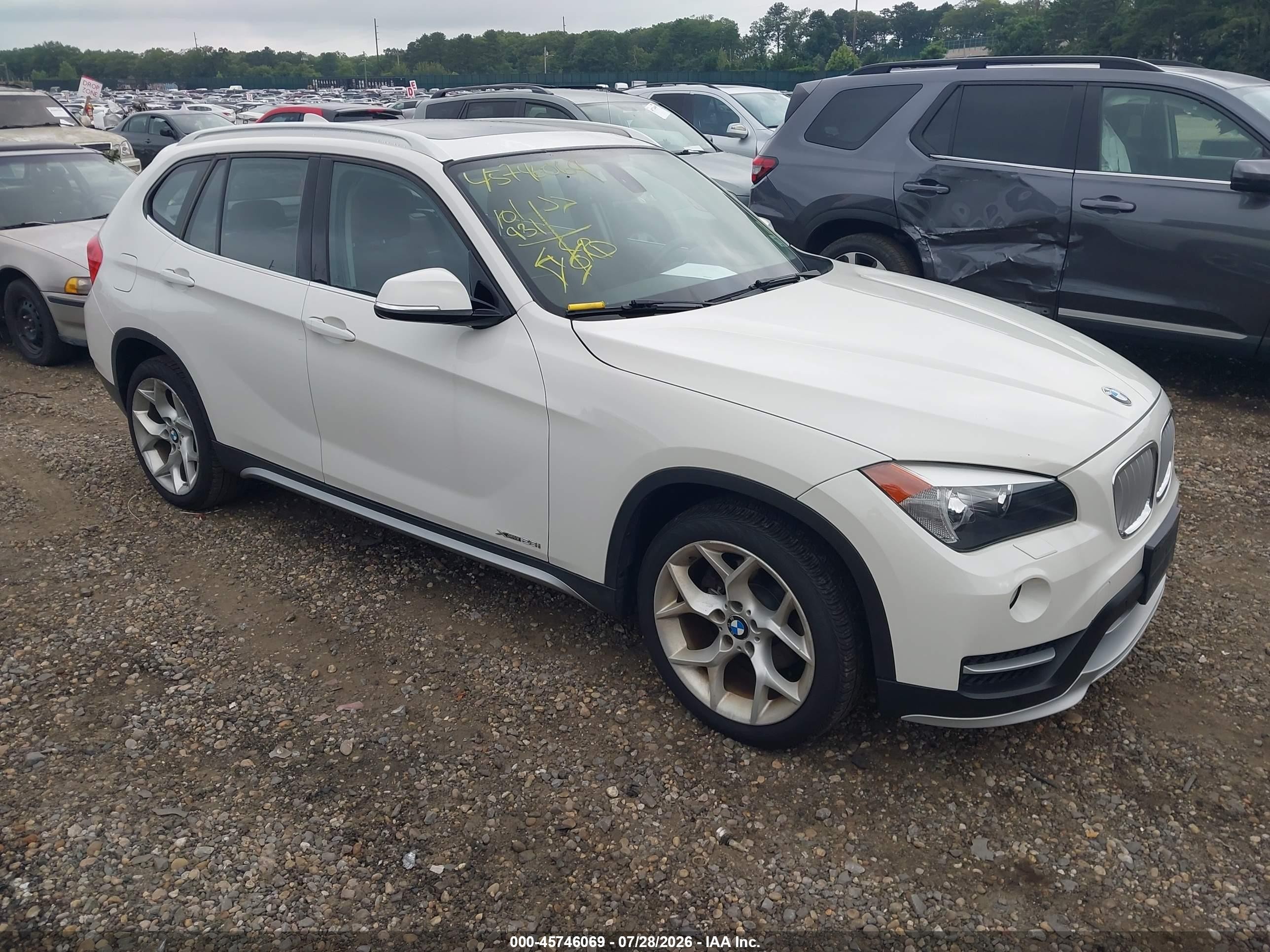 2015 BMW X1 xDrive28i, VIN WBAVL1C54FVY38325 — Normal wear