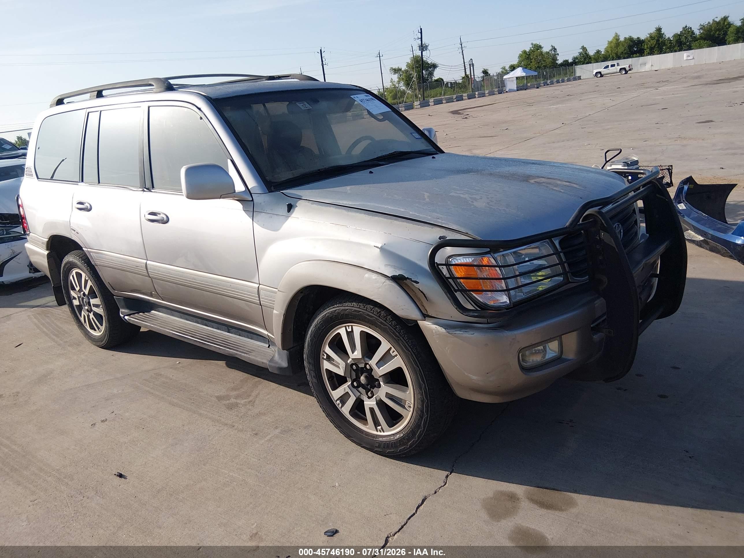 1999 Toyota Land Cruiser, VIN JT3HT05JXX0044307 — Side