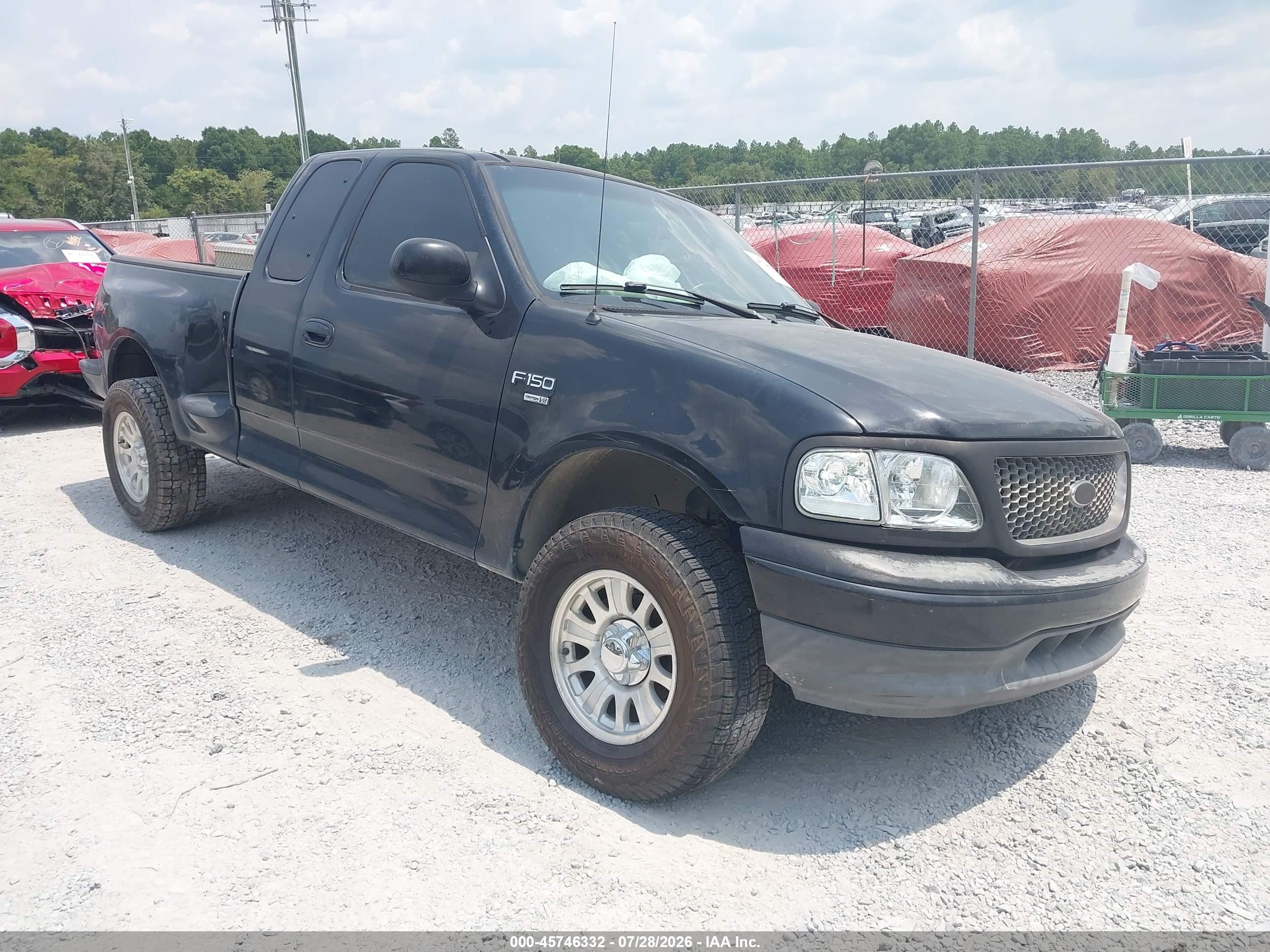 2003 Ford F-150 XL, VIN 1FTRX07W03KD64179 — Undercarriage