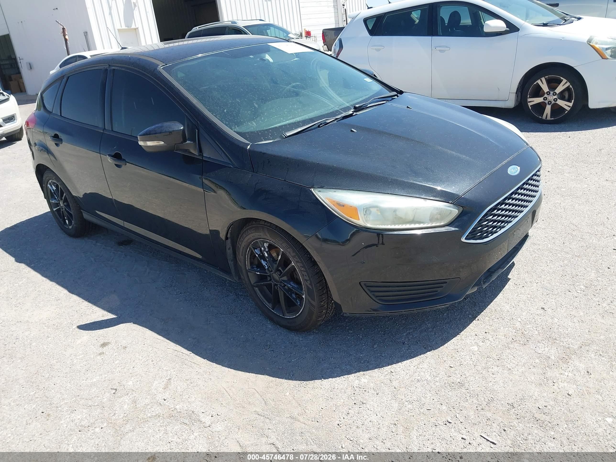 2015 Ford Focus SE, VIN 1FADP3K26FL283482 — Normal wear