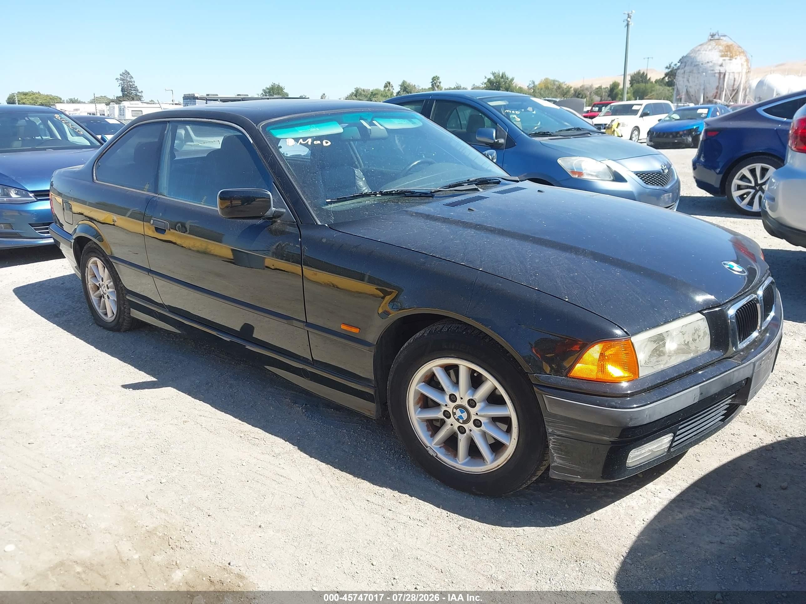 1999 BMW 3 Series, VIN WBABG233XXET38568 — Normal wear