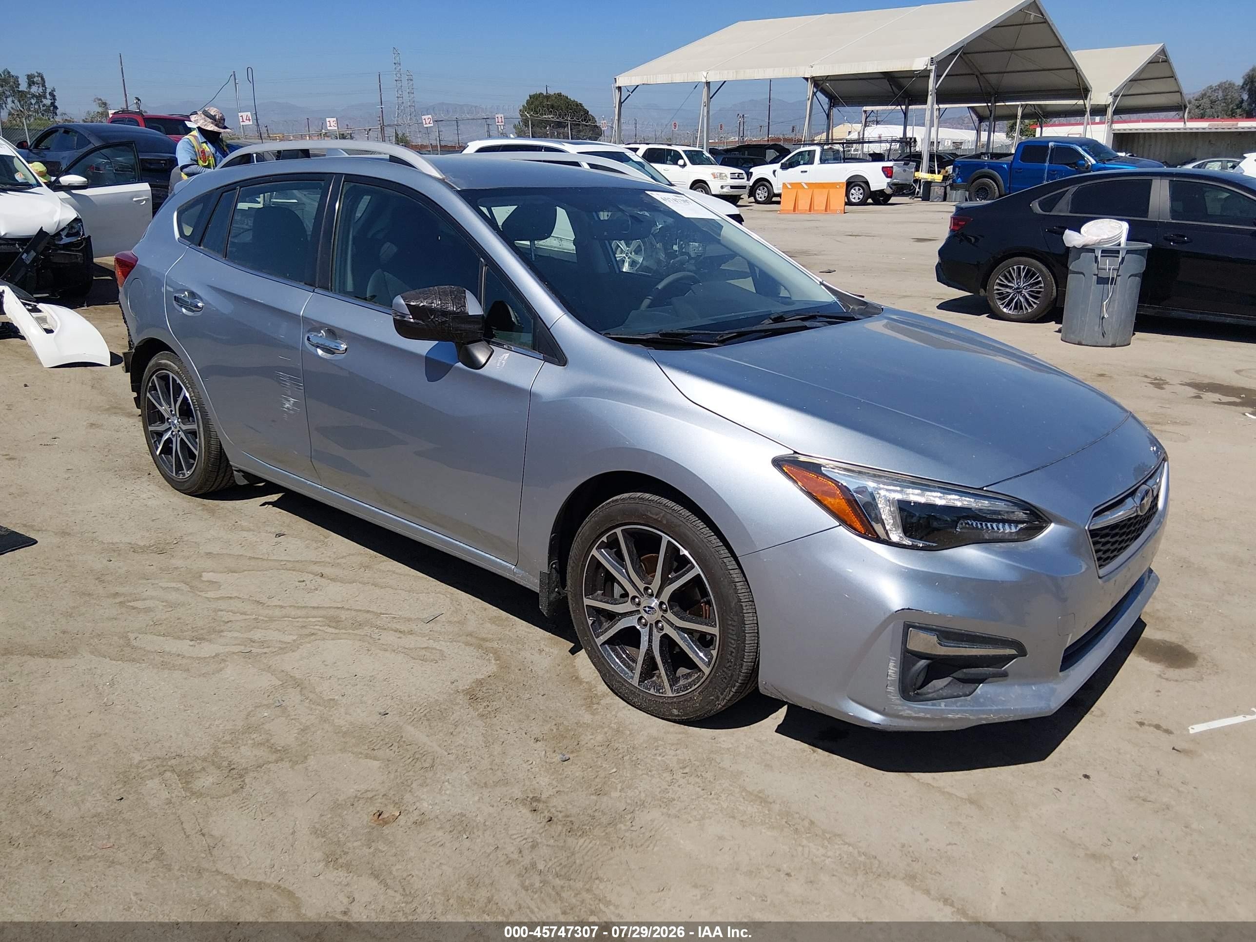 2017 Subaru Impreza Limited, VIN 4S3GTAN67H3737697 — Rear end