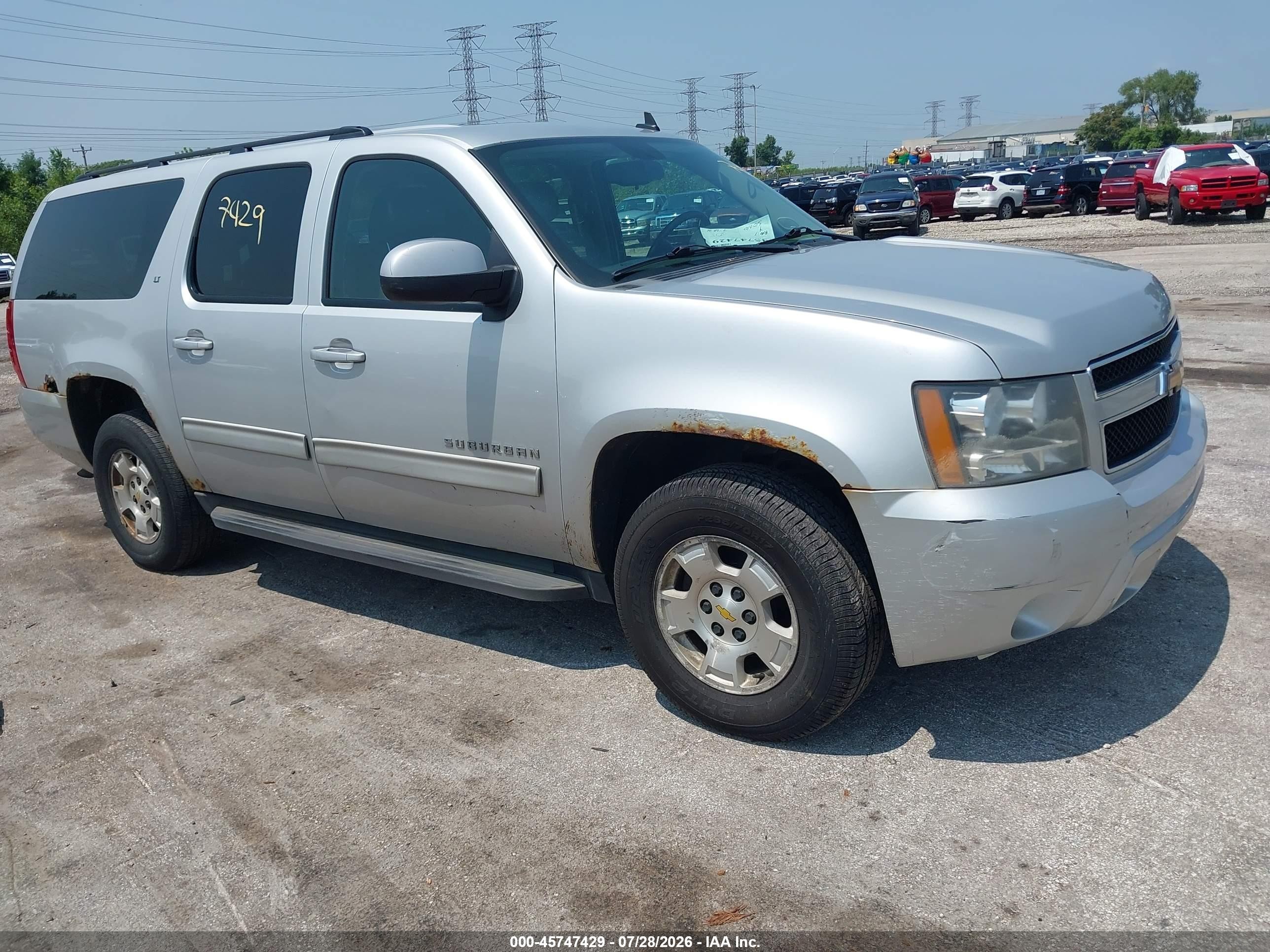 2011 Chevrolet Suburban LT, VIN 1GNSKJE3XBR108580 — Normal wear