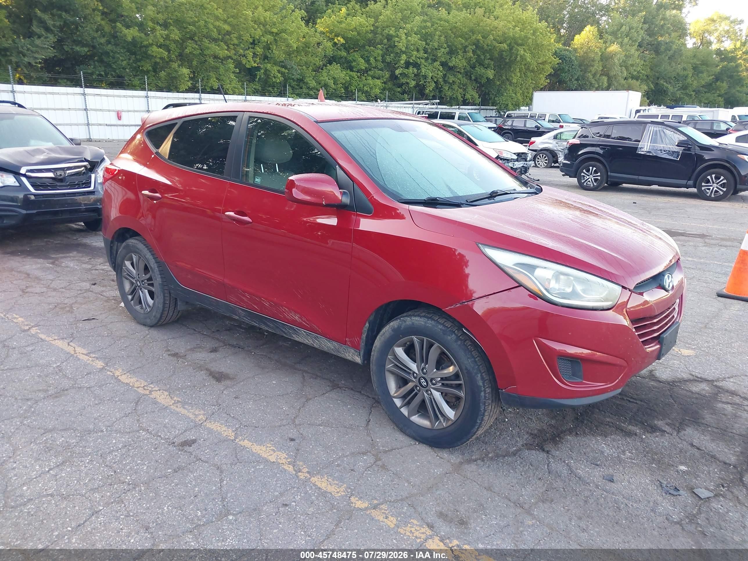 2014 Hyundai Tucson GLS, VIN KM8JT3AF1EU829901 — Side
