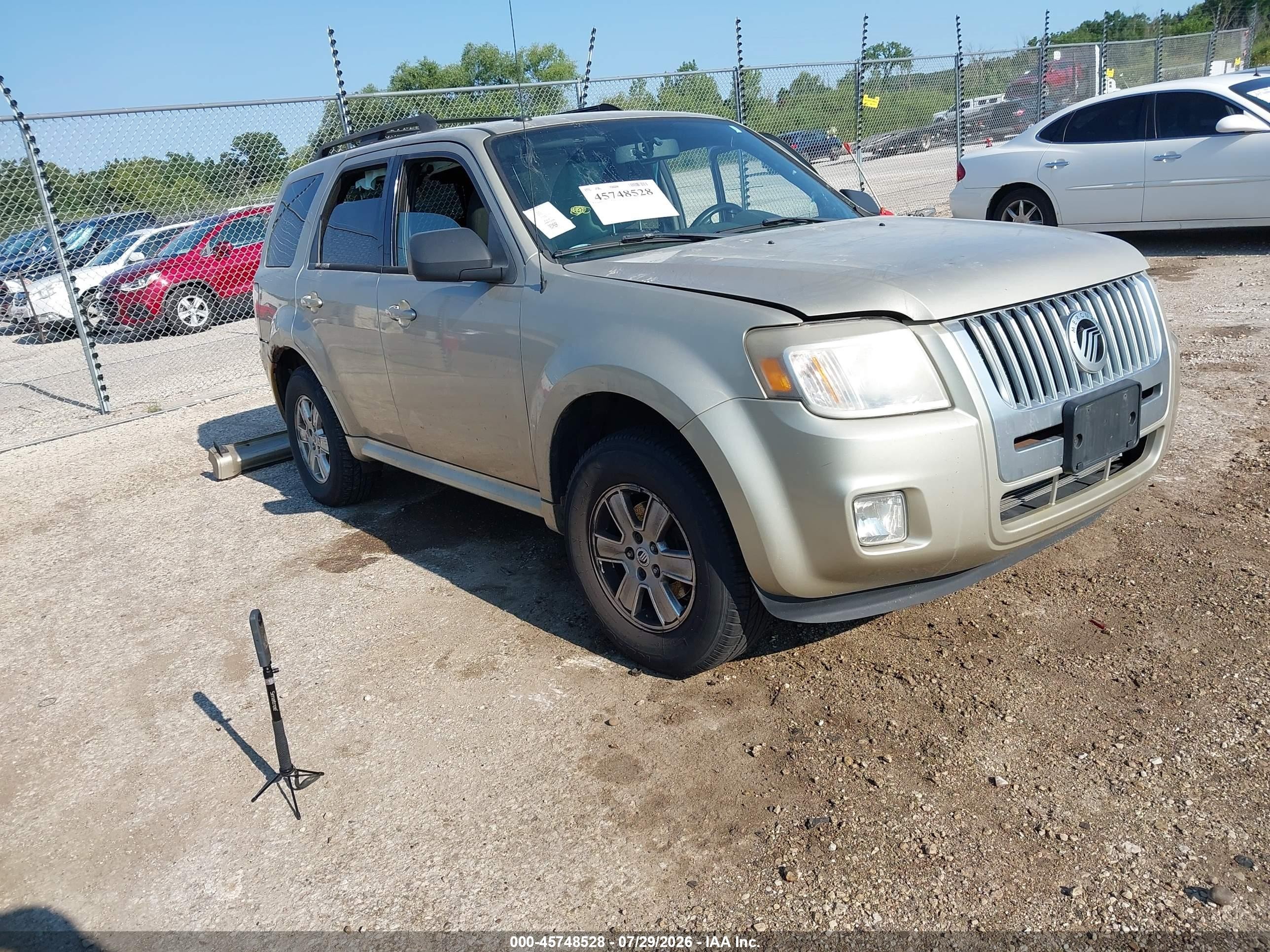 2010 Mercury Mariner, VIN 4M2CN8BG1AKJ30215 — Side
