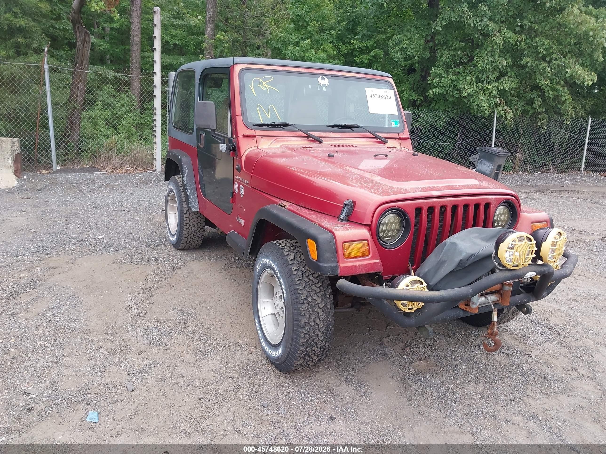 1999 Jeep Wrangler Sport, VIN 1J4FY19S7XP454786 — Normal wear