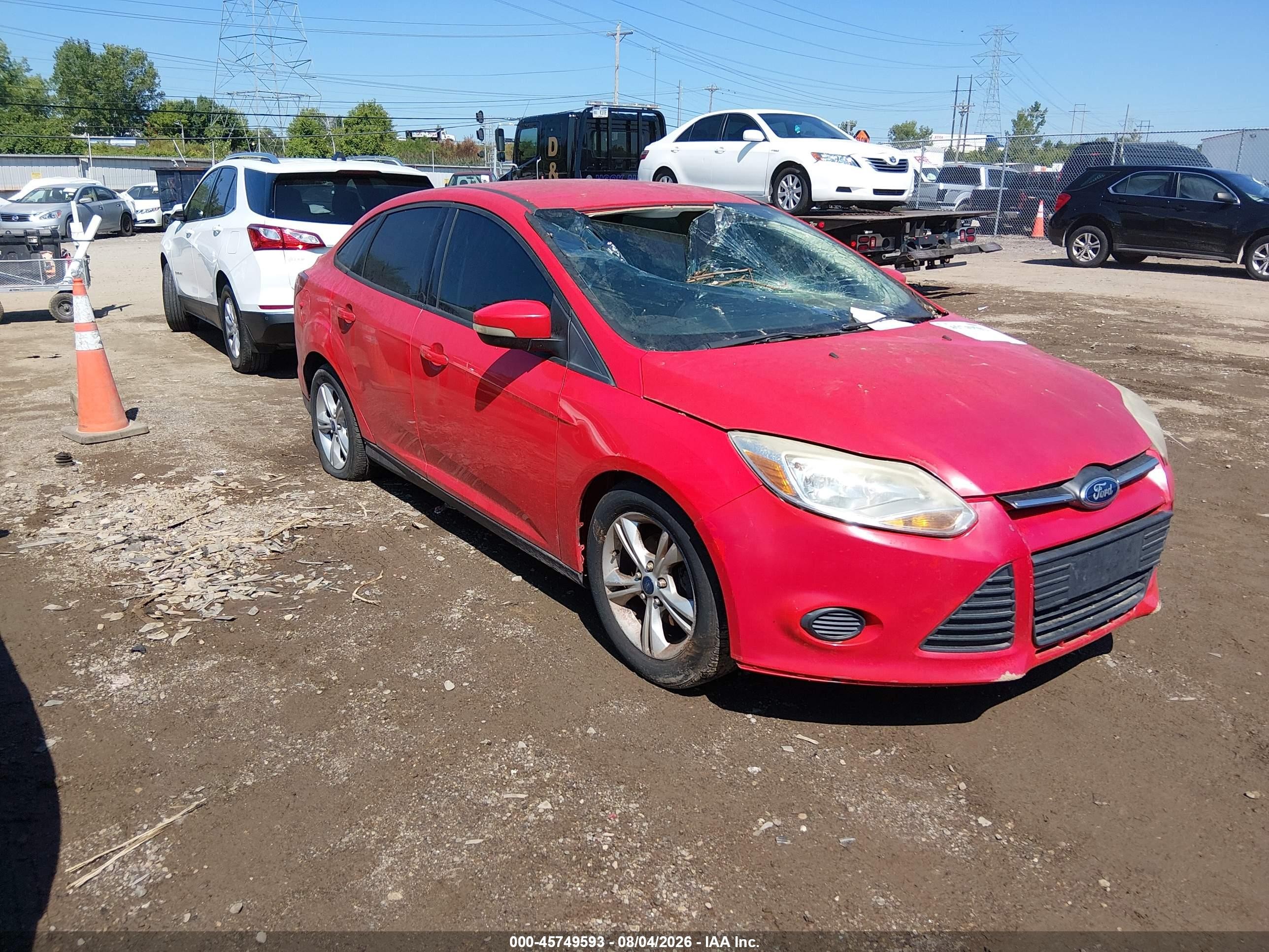 2014 Ford Focus SE, VIN 1FADP3F22EL450171 — Storm