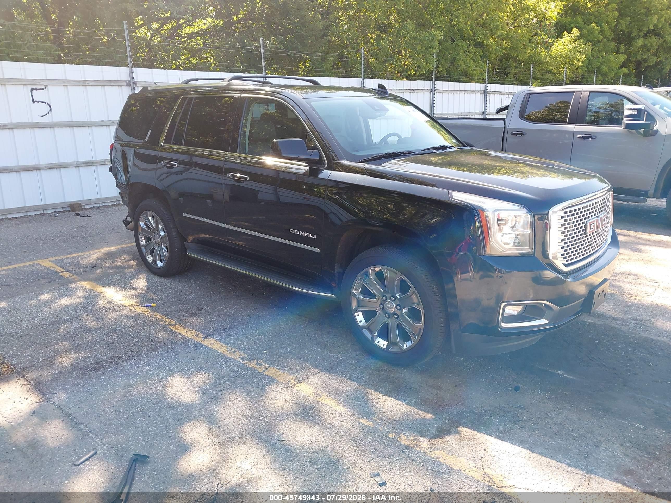 2016 GMC Yukon Denali, VIN 1GKS2CKJ3GR152522 — Rear end