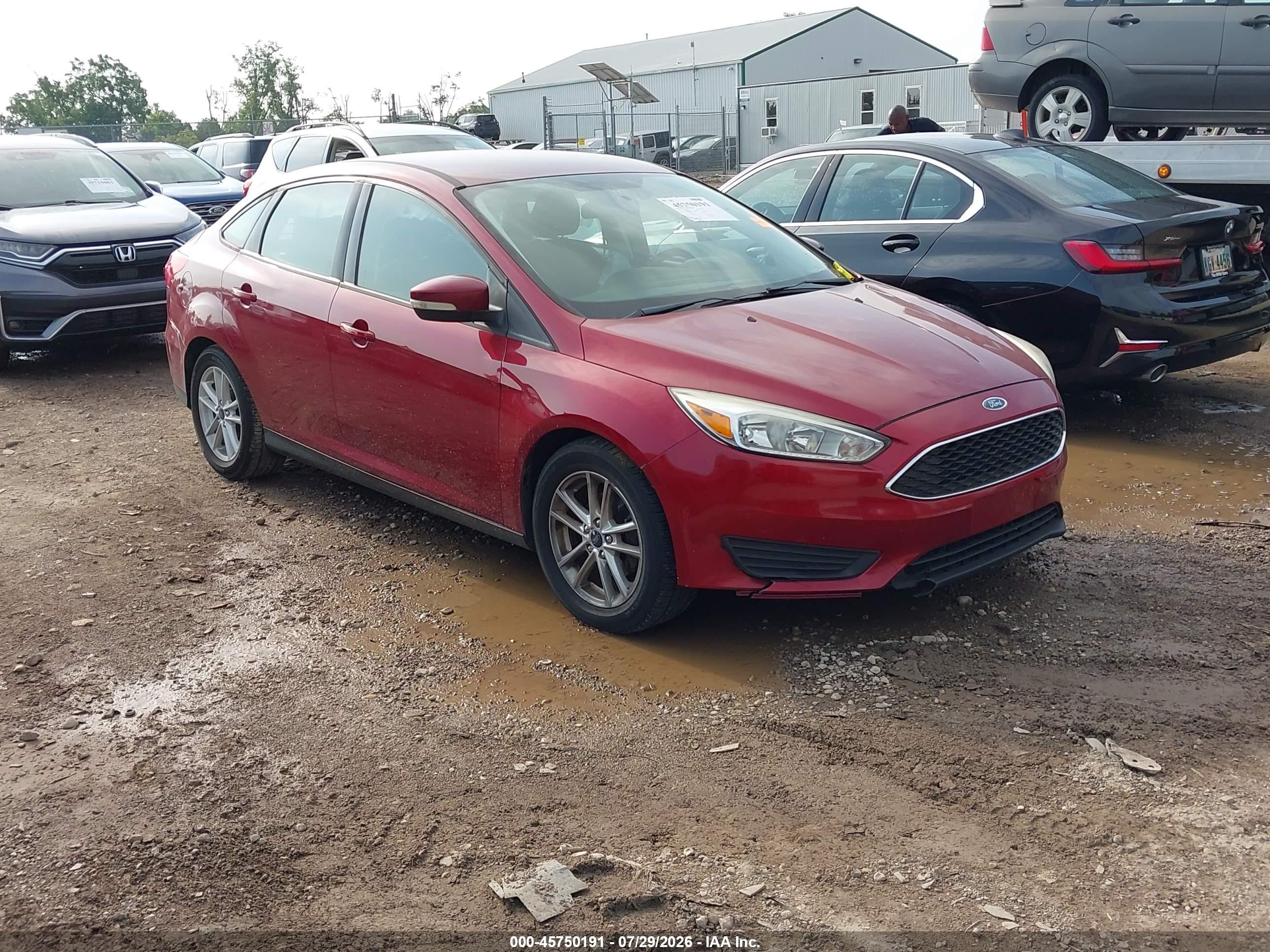 2016 Ford Focus SE, VIN 1FADP3F26GL280769 — Side