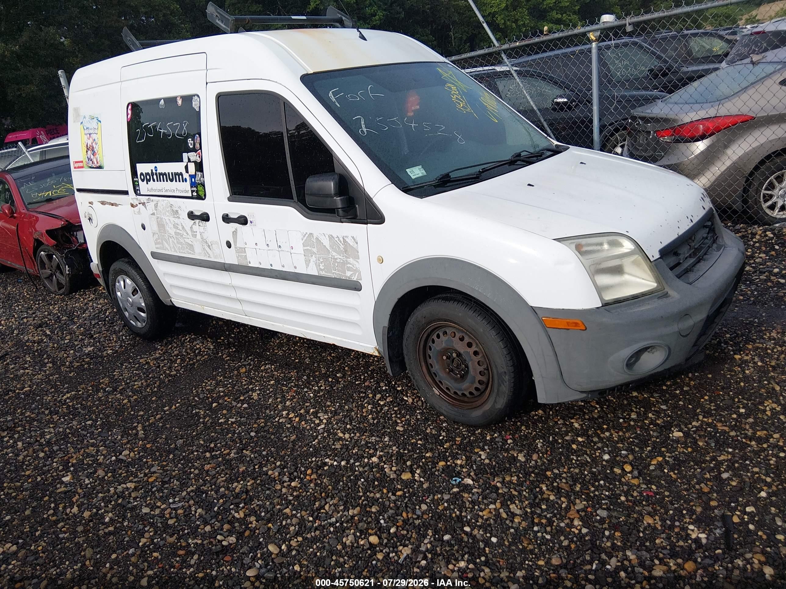 2010 Ford Transit Connect XL, VIN NM0LS6AN4AT003016 — Side