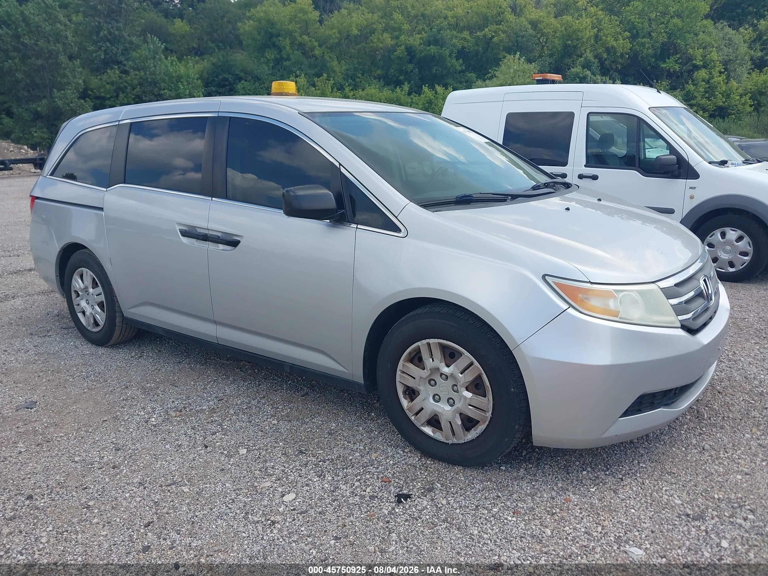 2013 Honda Odyssey LX, VIN 5FNRL5H25DB062499 — Side