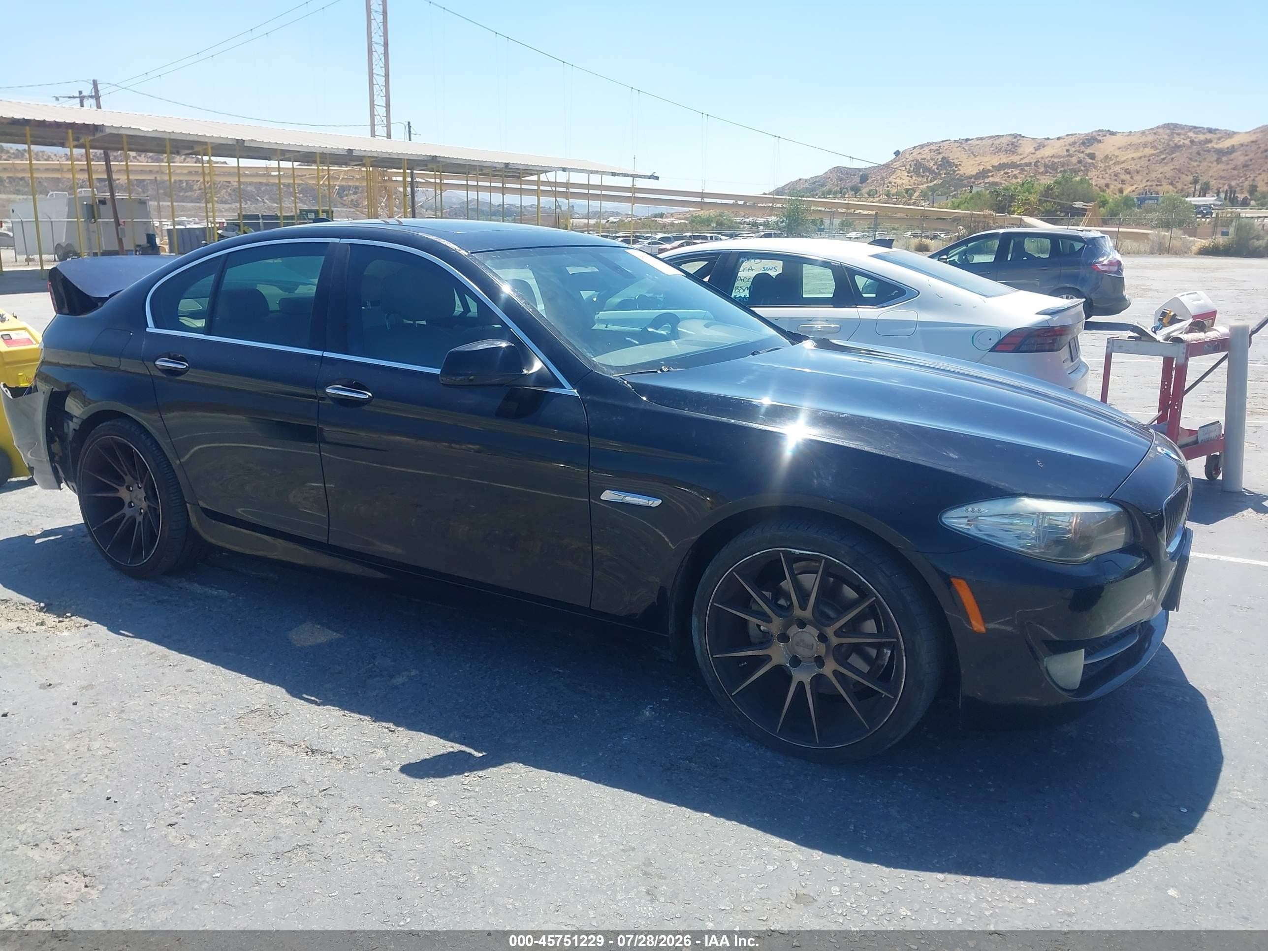 2011 BMW 5 Series 528i, VIN WBAFR1C52BC749071 — Rear end
