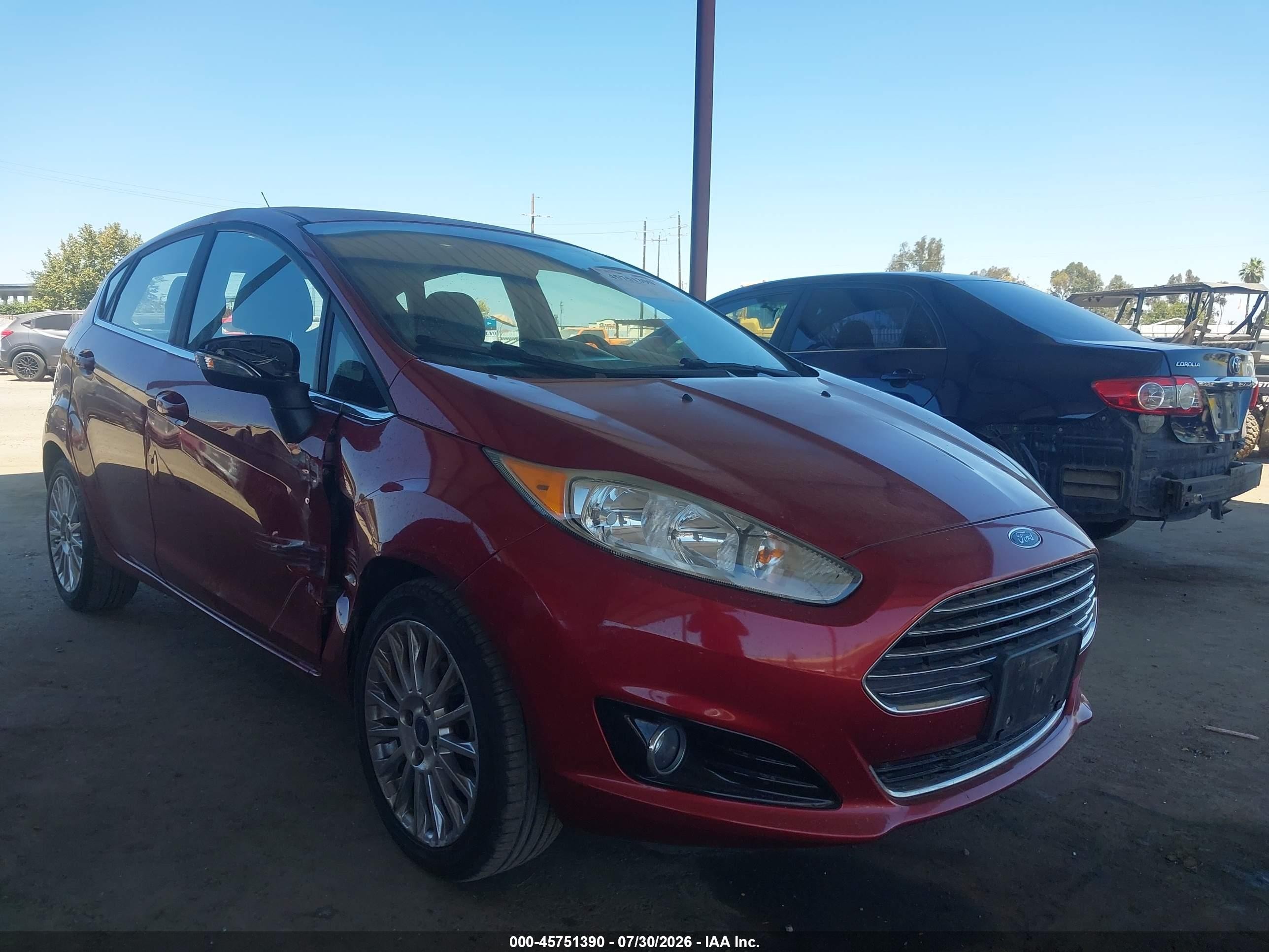 2014 Ford Fiesta Titanium, VIN 3FADP4FJ4EM228047 — Side