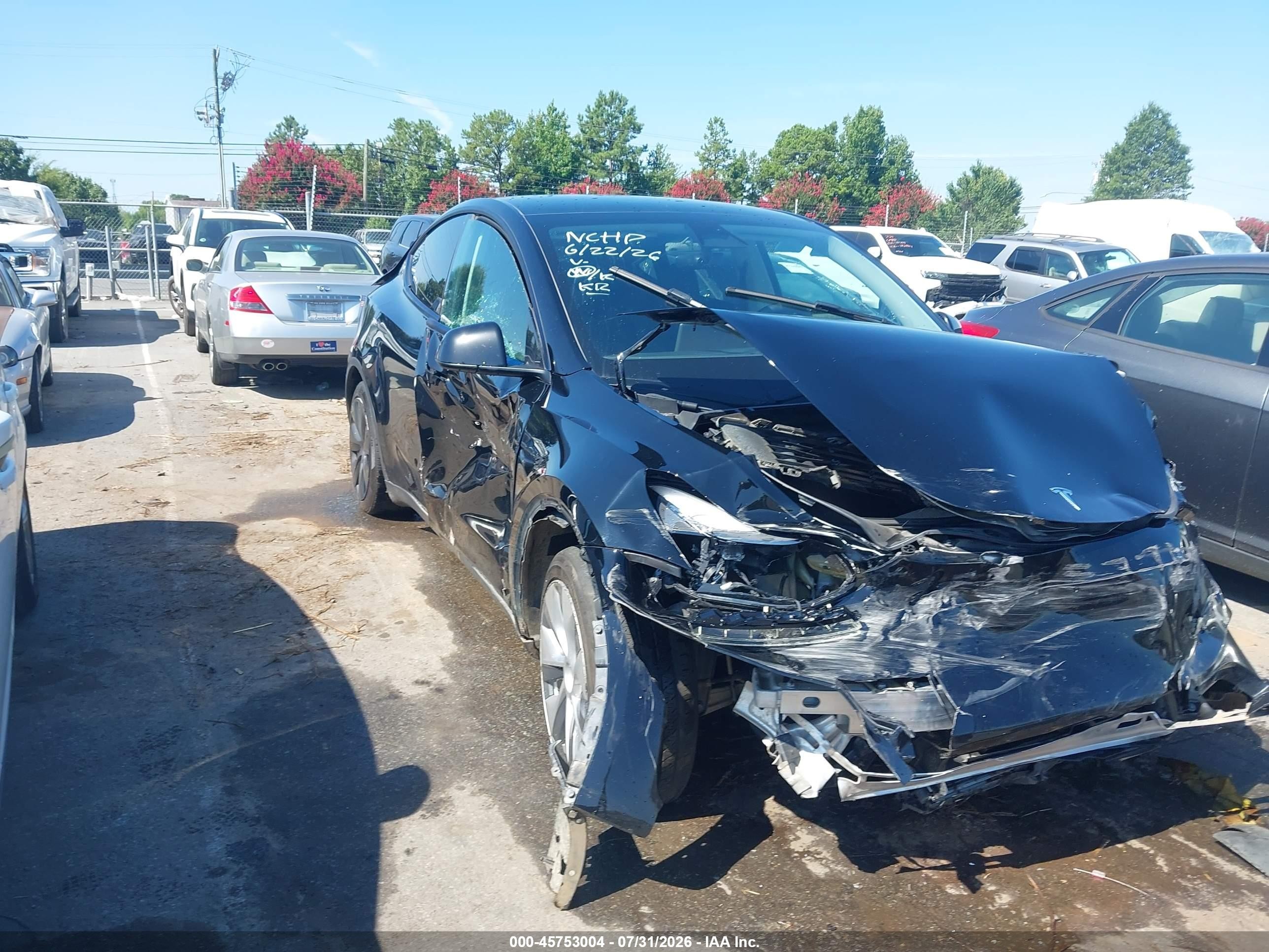 2023 Tesla Model Y Long Range, VIN 7SAYGDEEXPF706983 — All over