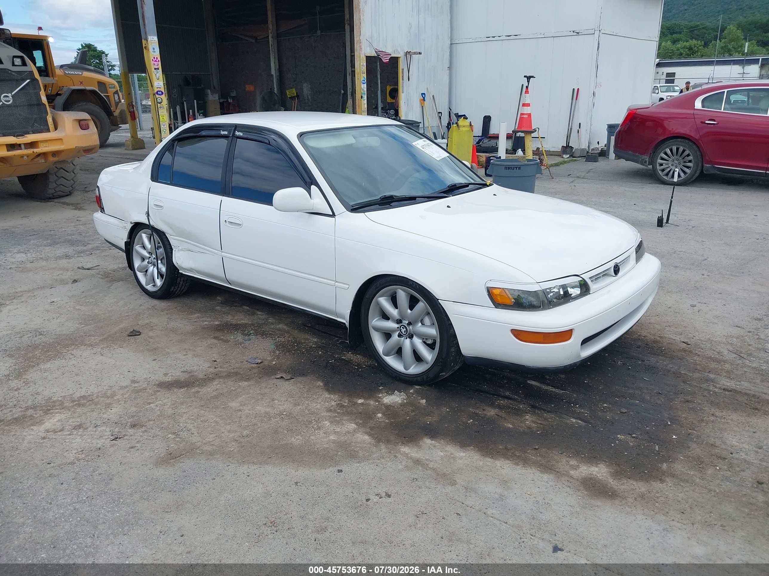 1997 Toyota Corolla DX, VIN 2T1BB02E2VC201181 — Бок