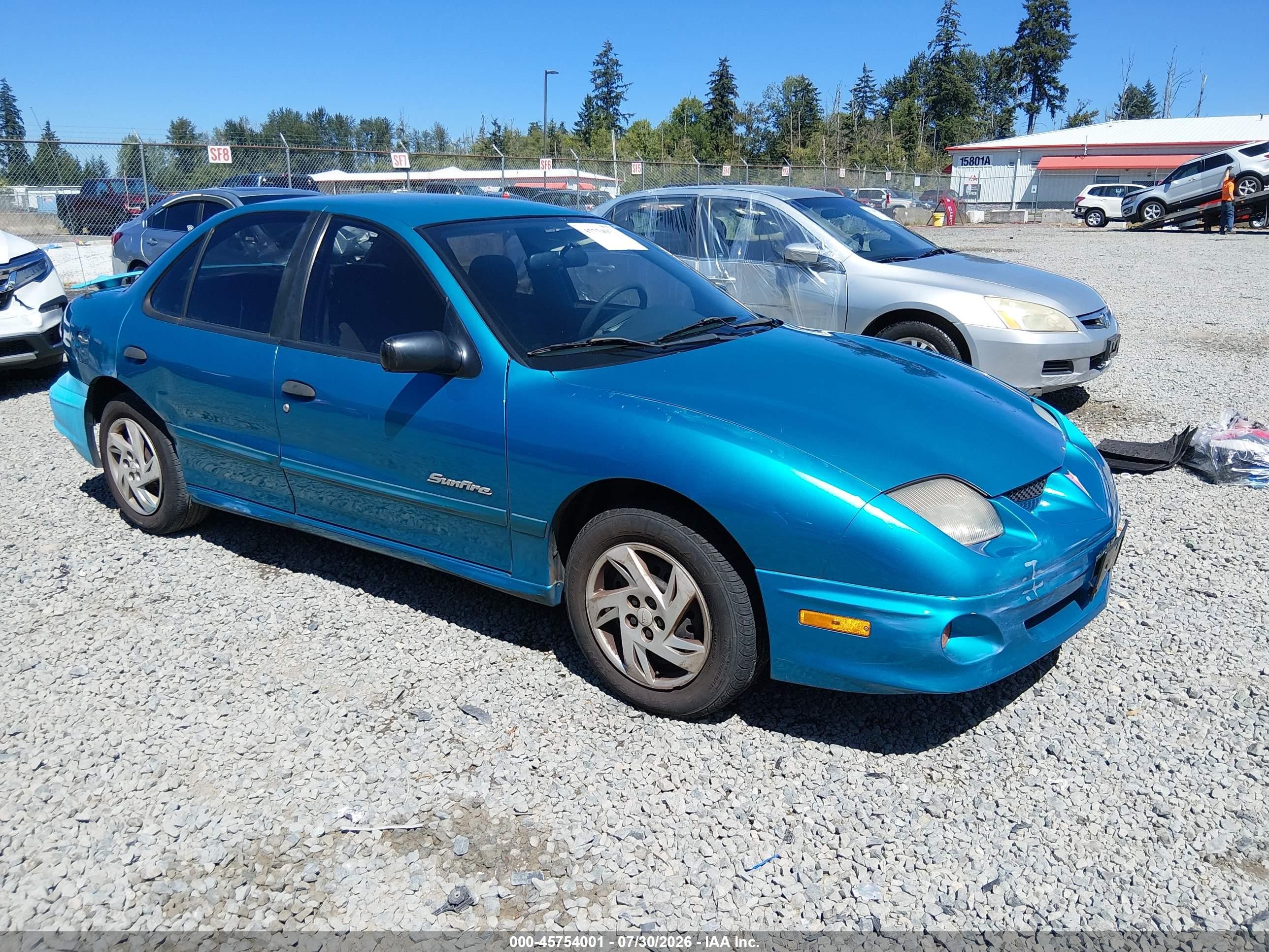 2000 Pontiac Sunfire SE, VIN 1G2JB5248Y7240044 — Side