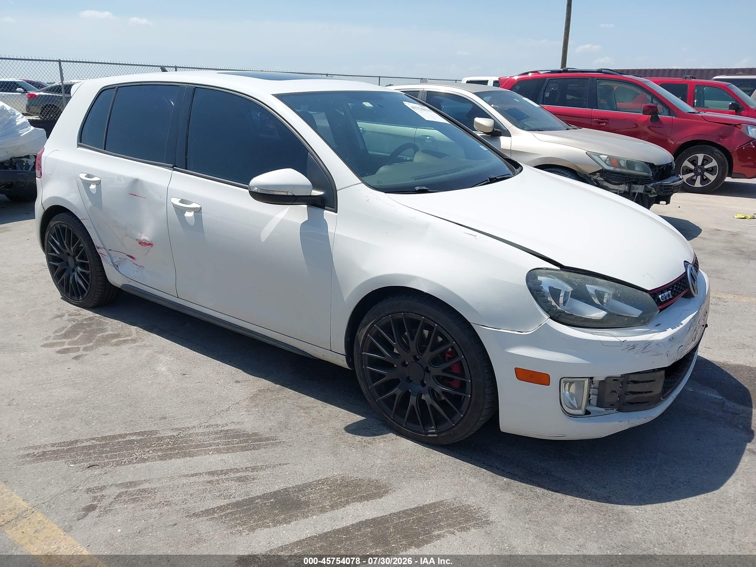 2013 Volkswagen Golf GTI, VIN WVWHV7AJ9DW116126 — Side