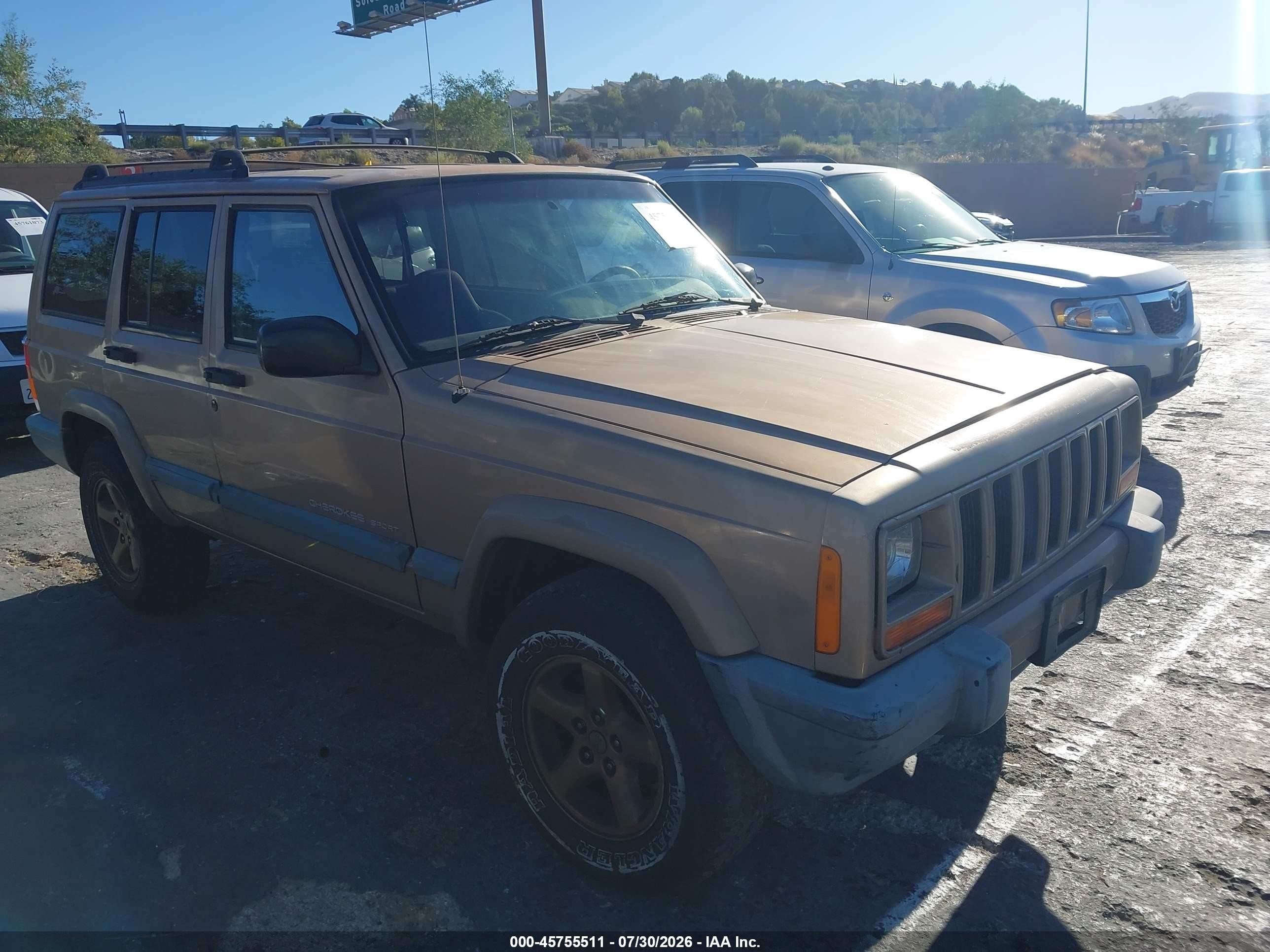 1999 Jeep Cherokee Sport, VIN 1J4FT68S7XL553158 — Normal wear