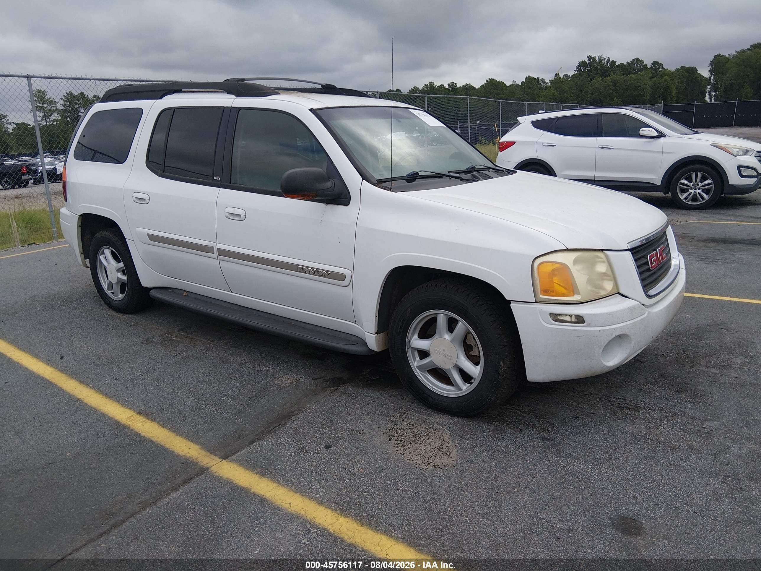 2003 GMC Envoy SLT, VIN 1GKES16S636127582 — Rear end
