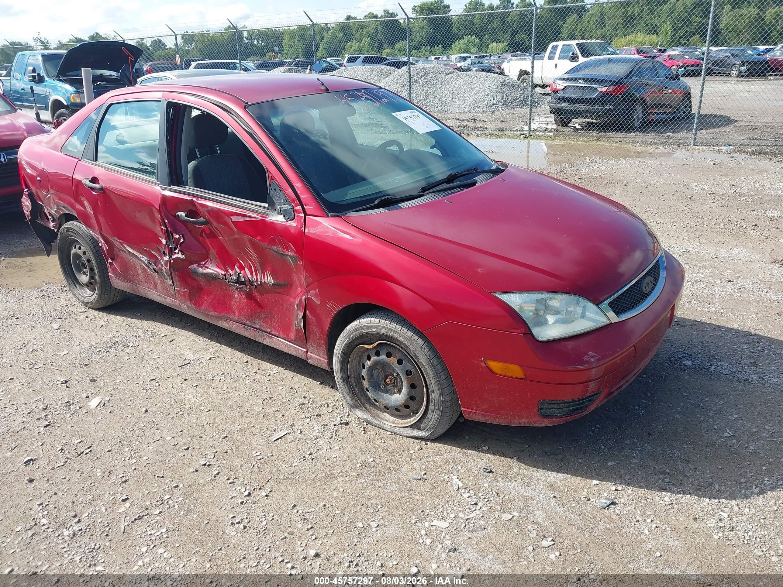 2005 Ford Focus S, VIN 1FAFP34N85W307472 — Side