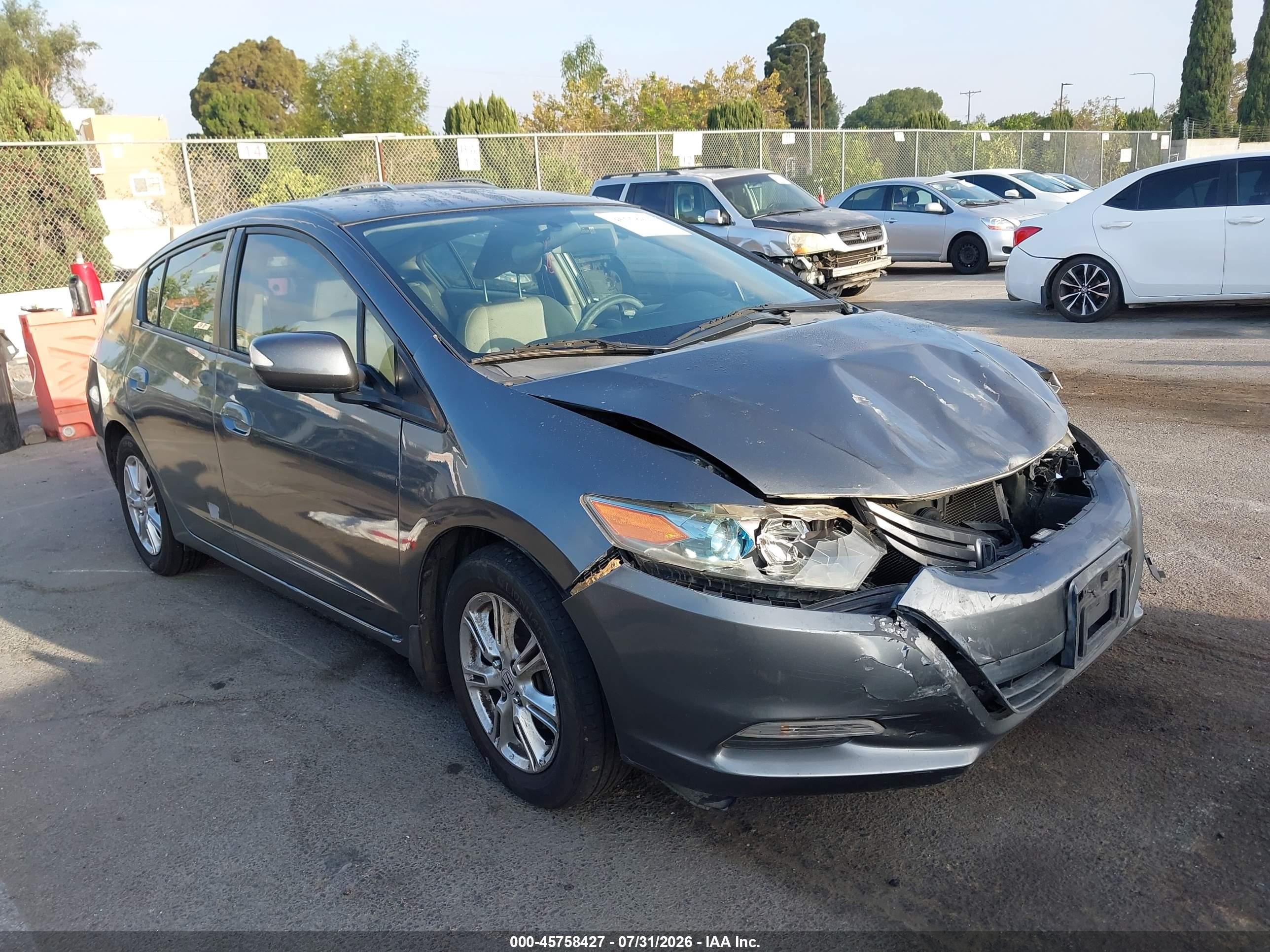 2010 Honda Insight EX, VIN JHMZE2H74AS028944 — Front end