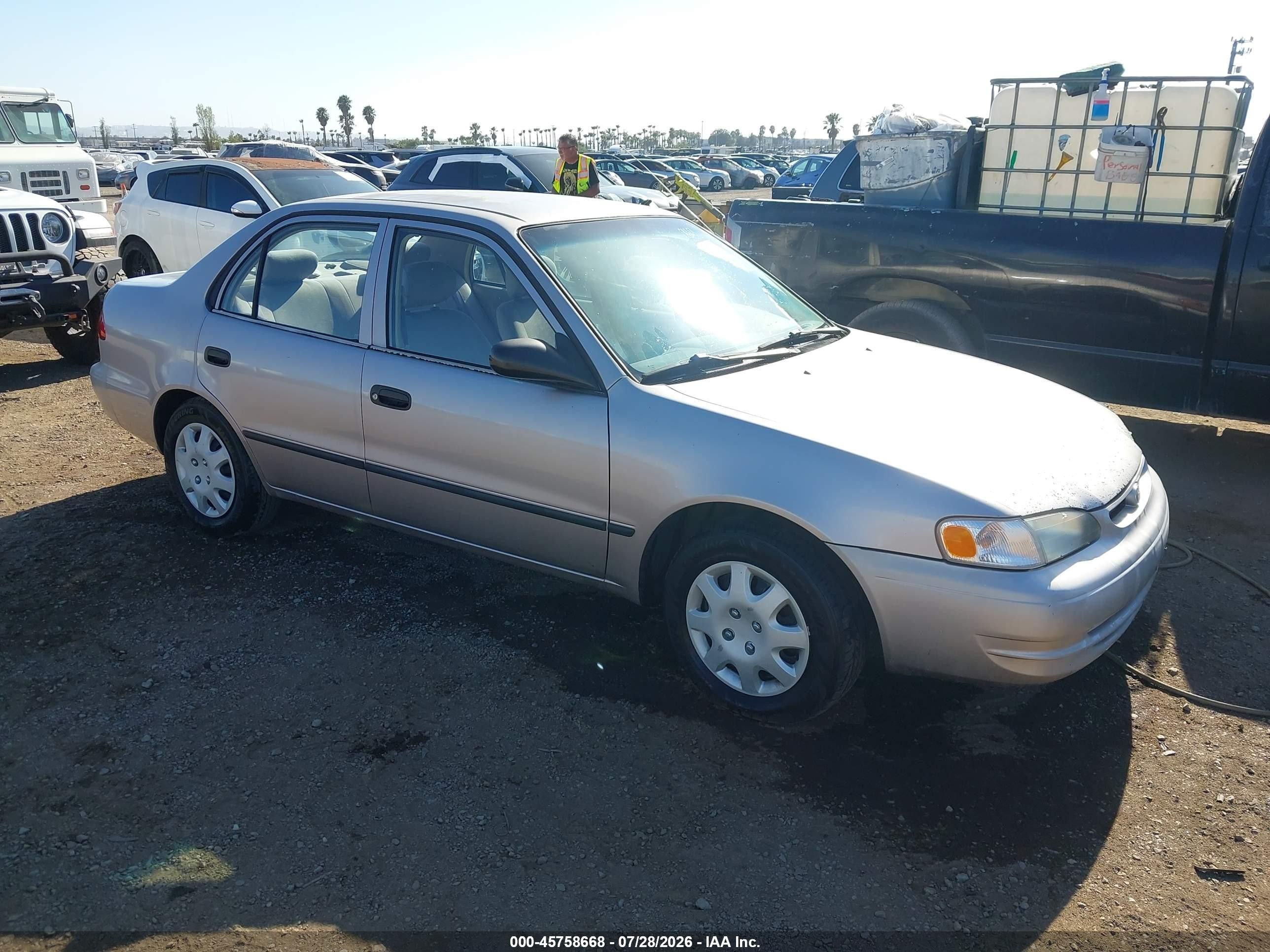 2000 Toyota Corolla CE, VIN 1NXBR12E4YZ394177 — Normal wear