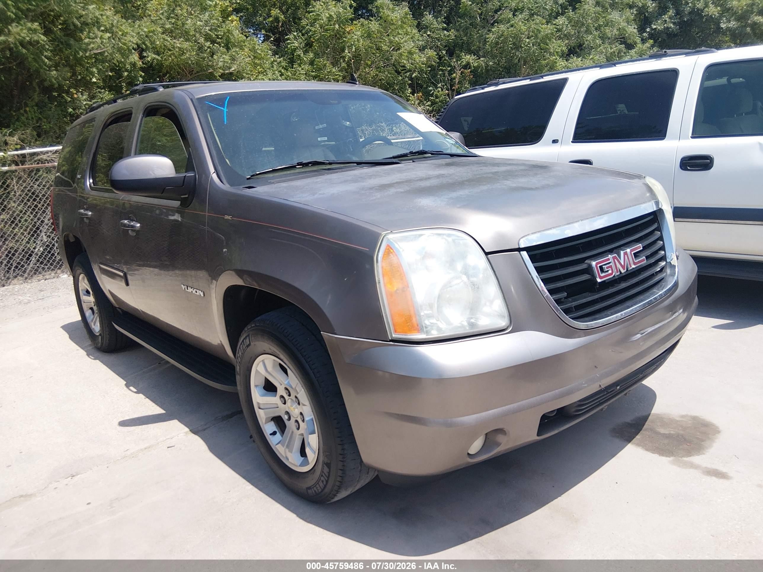2011 GMC Yukon SLT, VIN 1GKS1CE05BR218535 — Normal wear