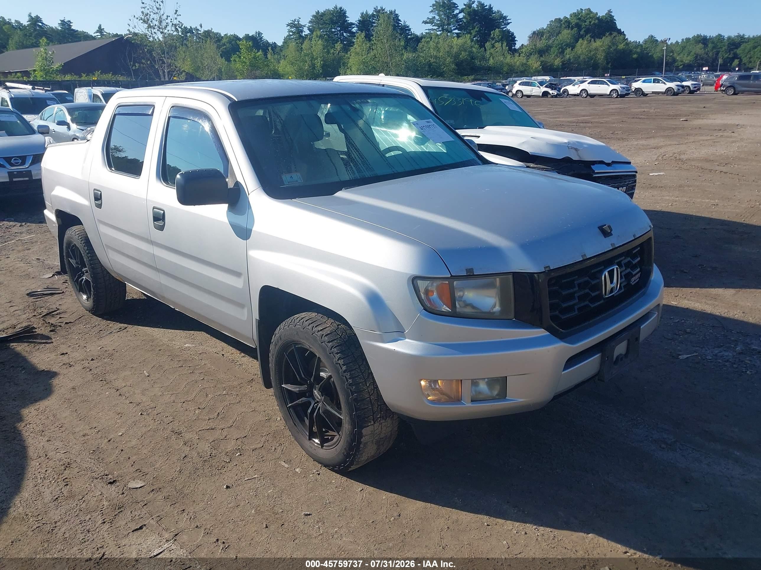 2014 Honda Ridgeline Sport, VIN 5FPYK1F7XEB002622 — Normal wear