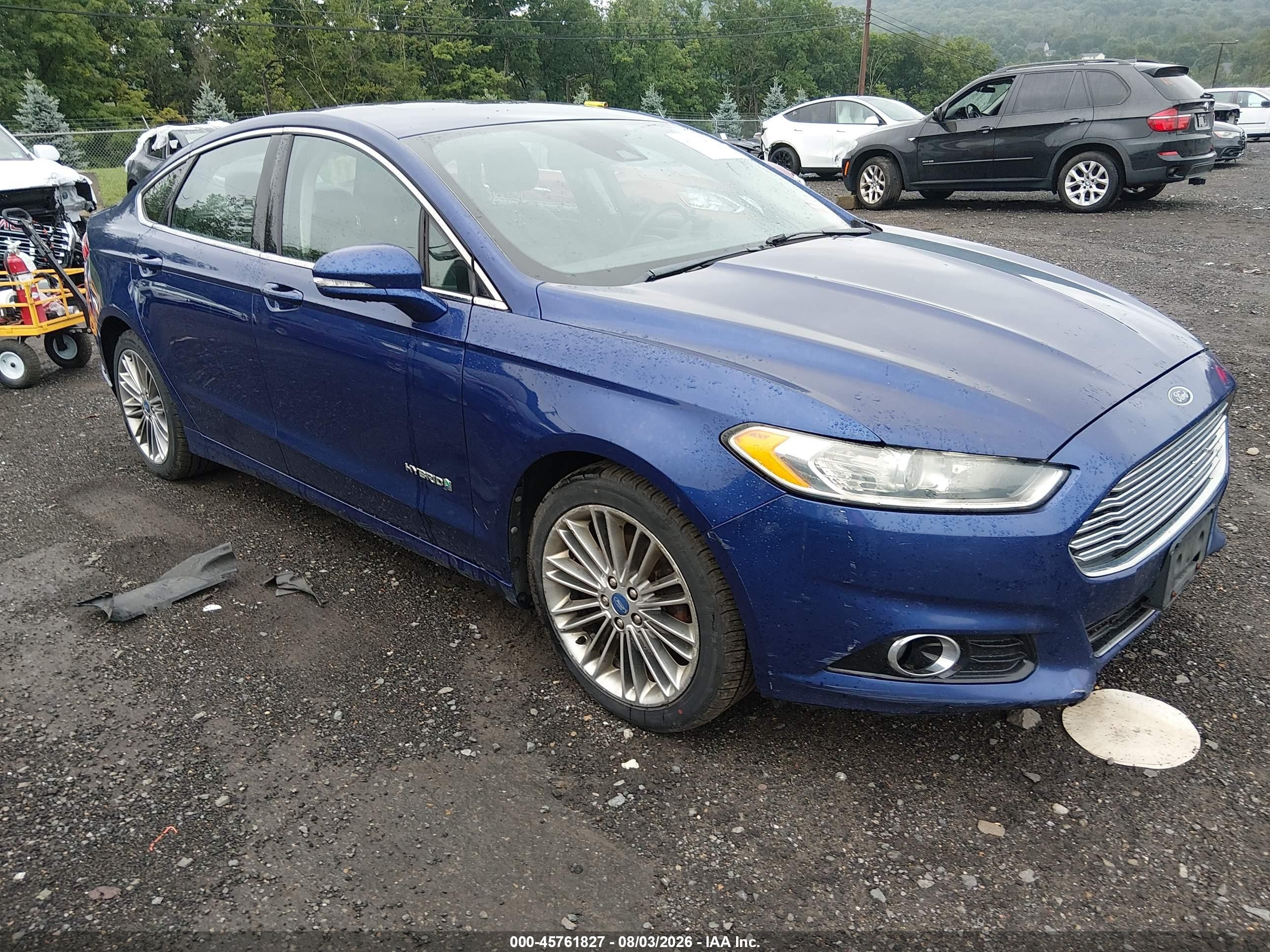 2013 Ford Fusion SE Hybrid, VIN 3FA6P0LU5DR246350 — Normal wear