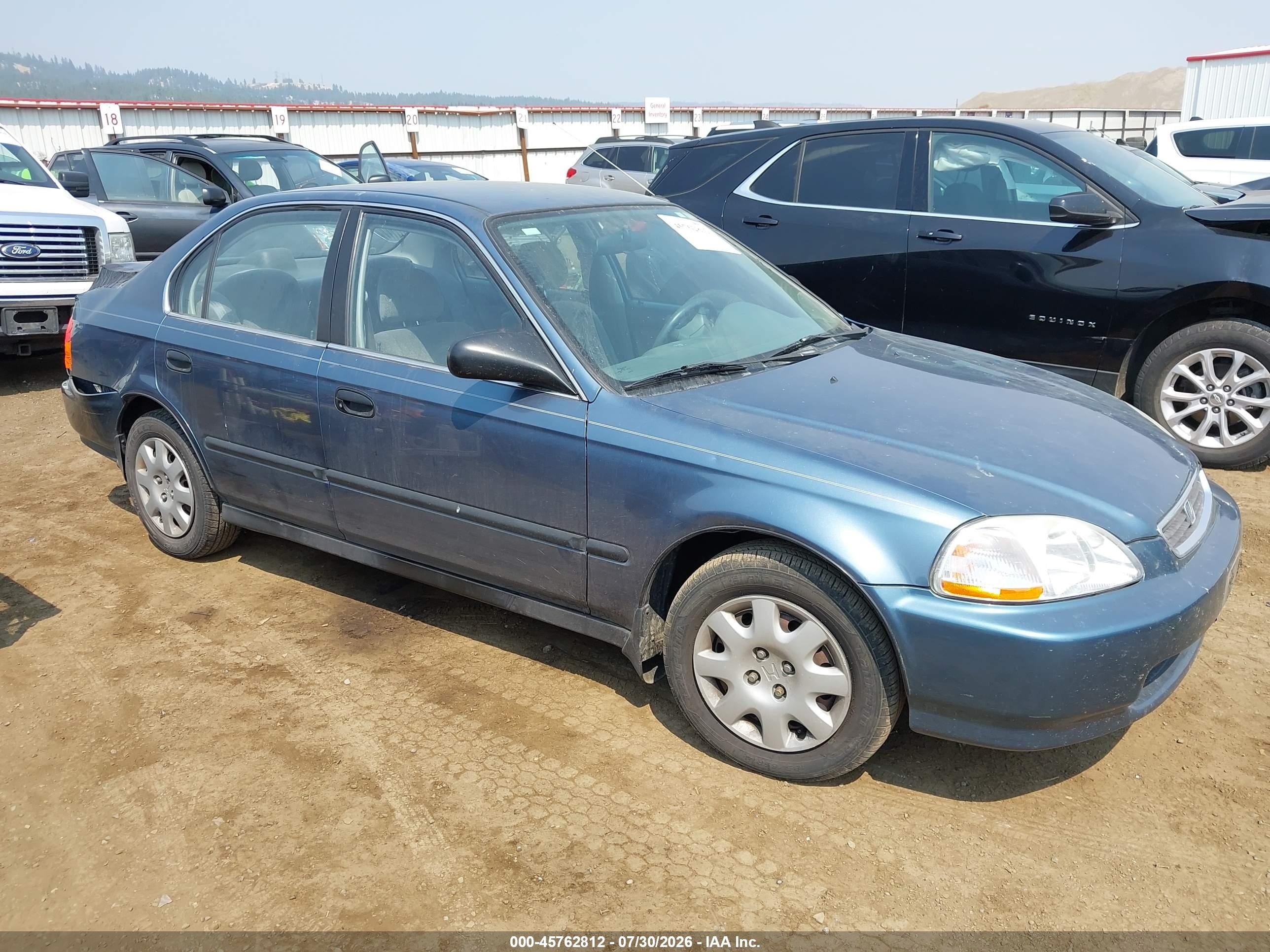 1998 Honda Civic LX, VIN 2HGEJ6672WH533886 — Зад