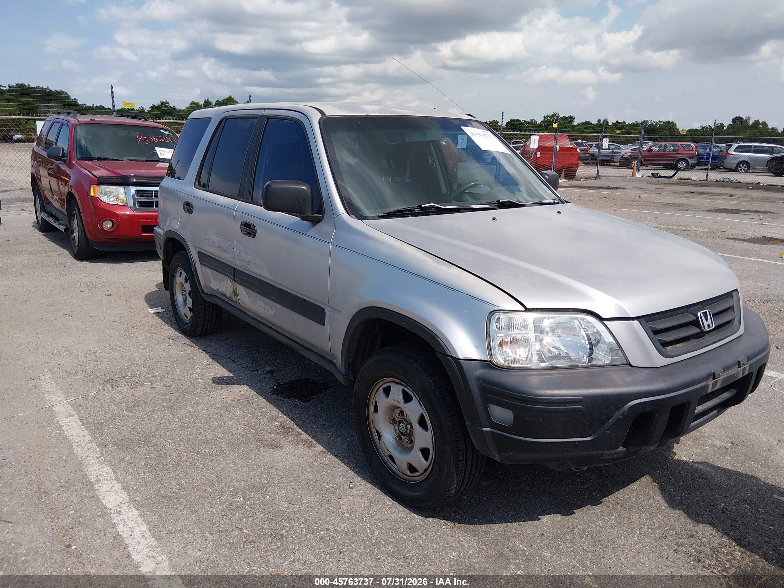 2001 Honda CR-V LX, VIN JHLRD284X1S016942 — Side