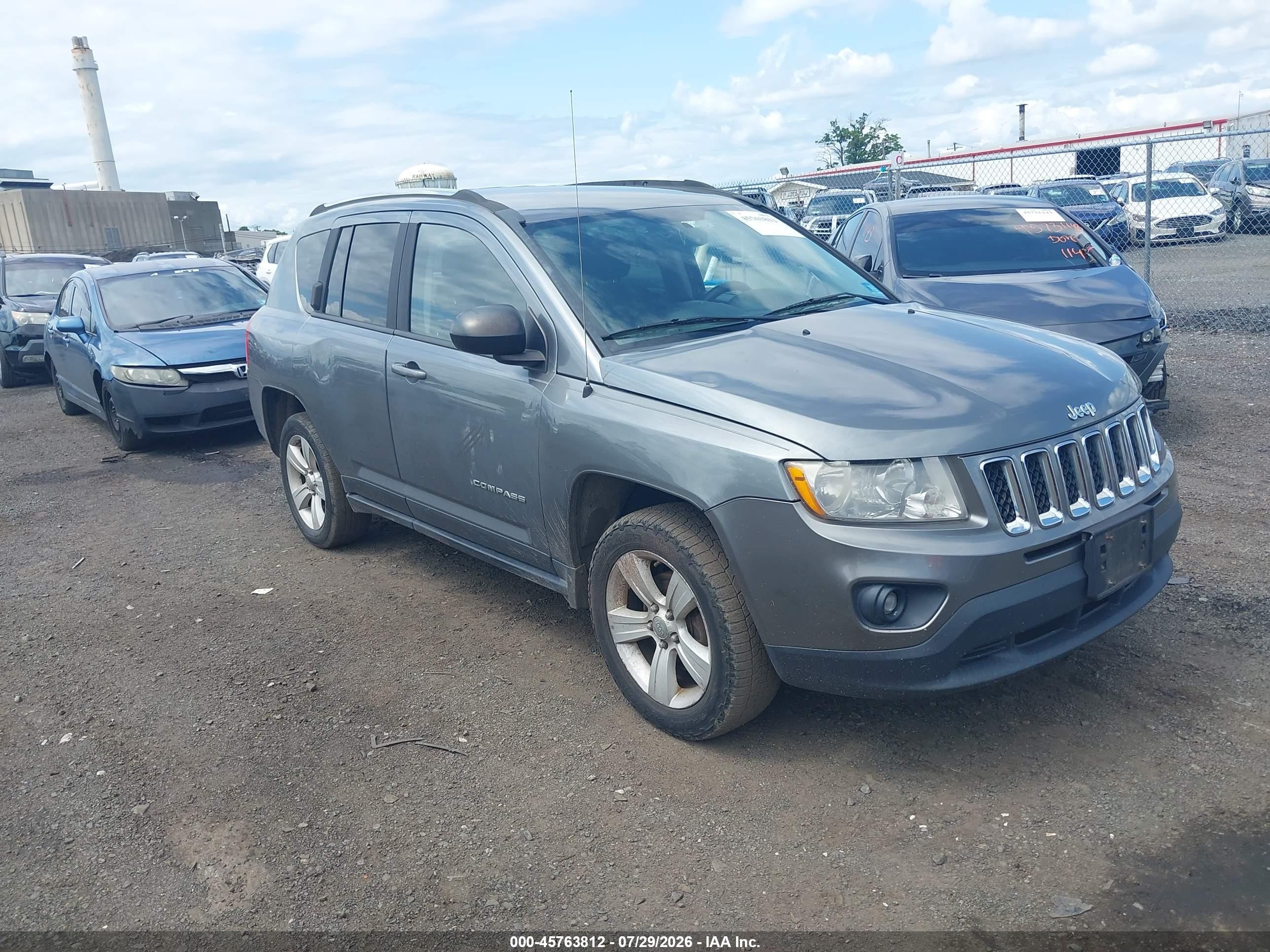 2012 Jeep Compass Sport, VIN 1C4NJCBB2CD586801 — Normal wear