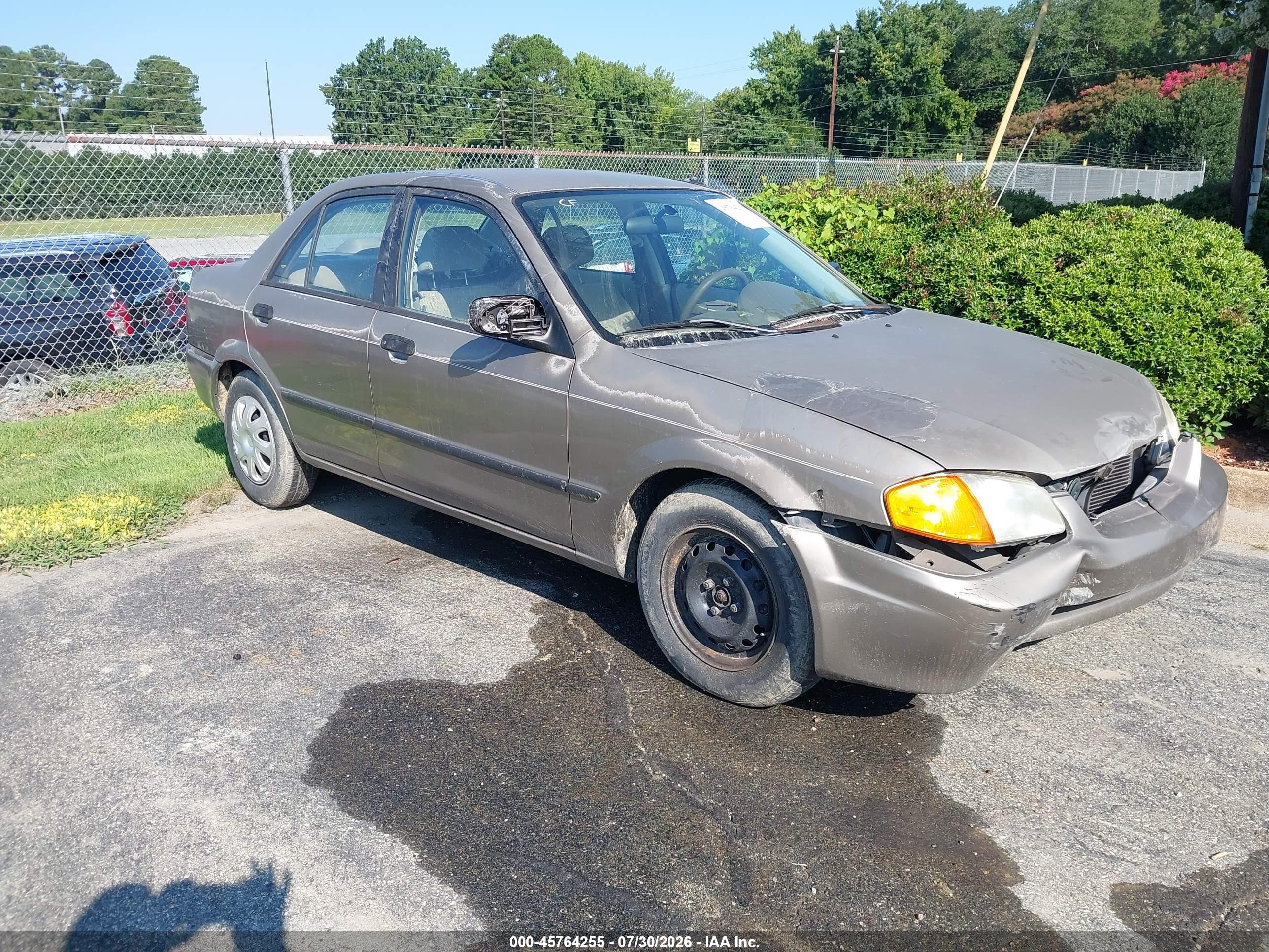 1999 Mazda Protege DX, VIN JM1BJ2223X0194842 — Front end