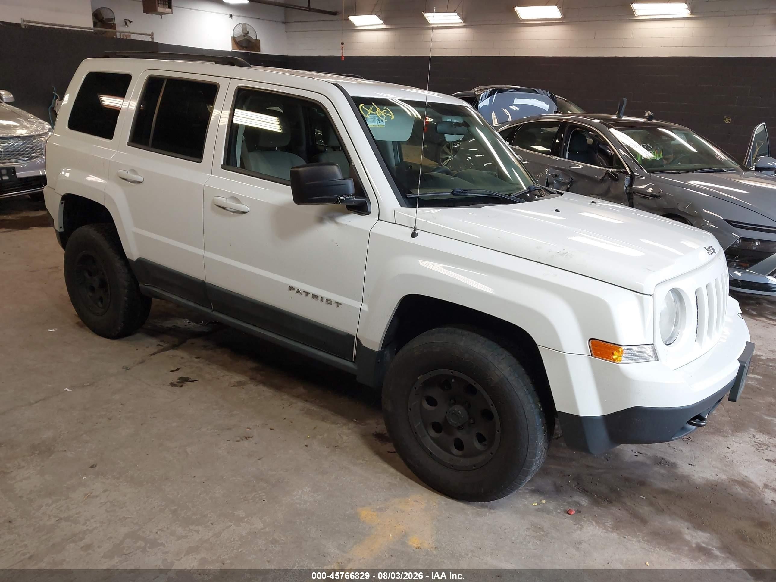 2011 Jeep Patriot Sport, VIN 1J4NF1GB6BD202347 — Side
