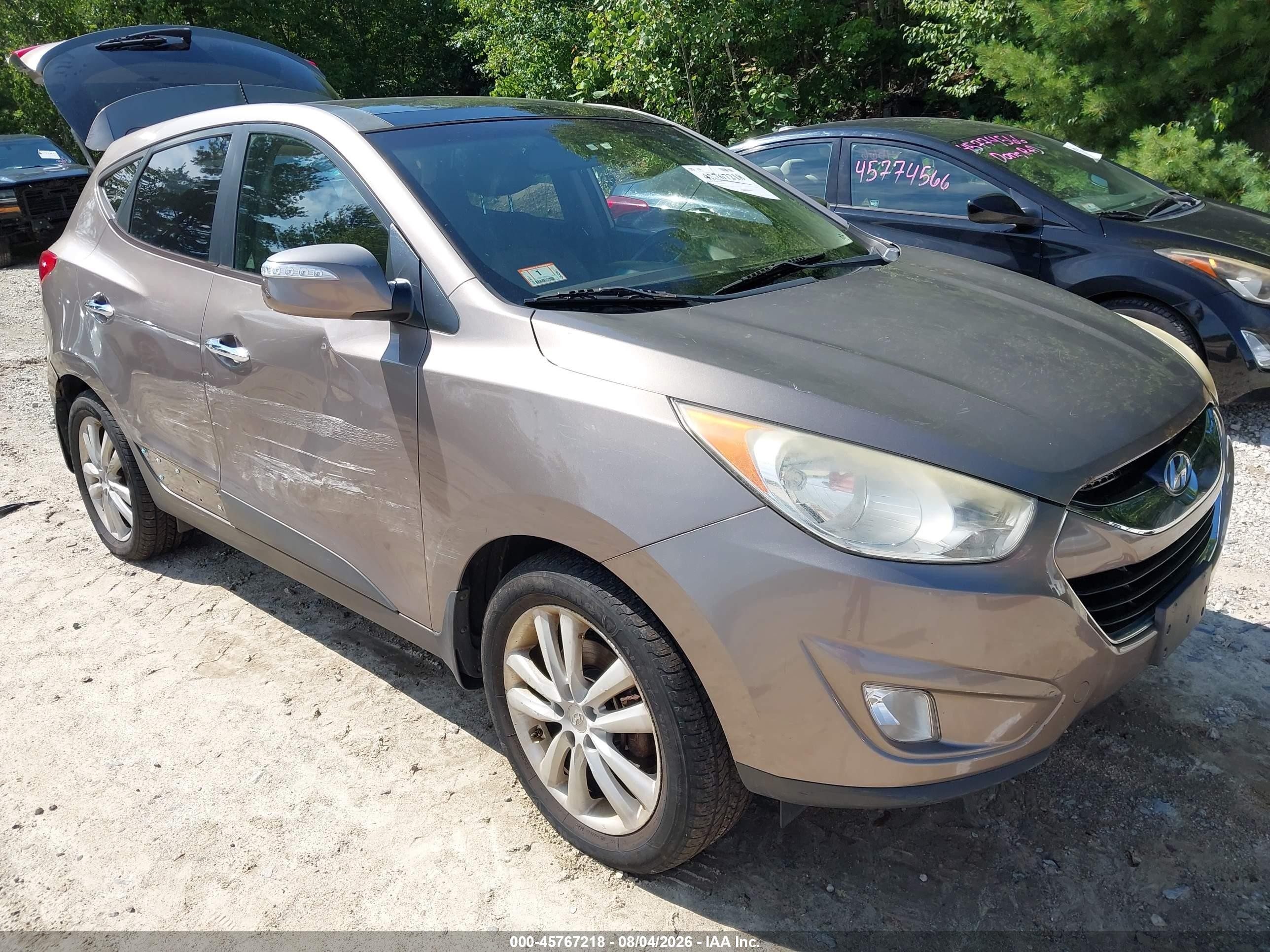 2013 Hyundai Tucson GLS, VIN KM8JUCAC5DU665893 — Side