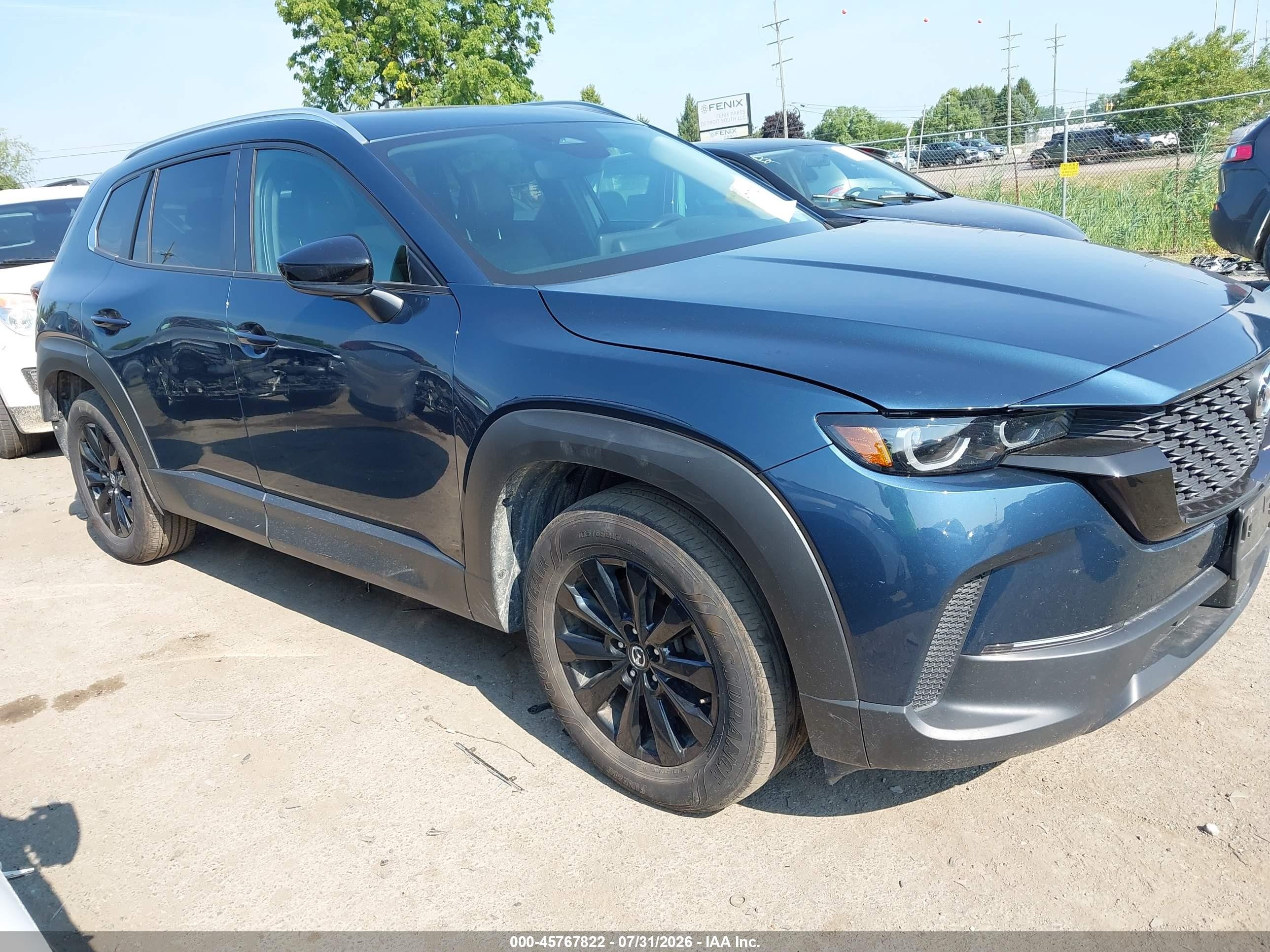 2025 Mazda CX-50 S Premium, VIN 7MMVABDM3SN346223 — Rear end