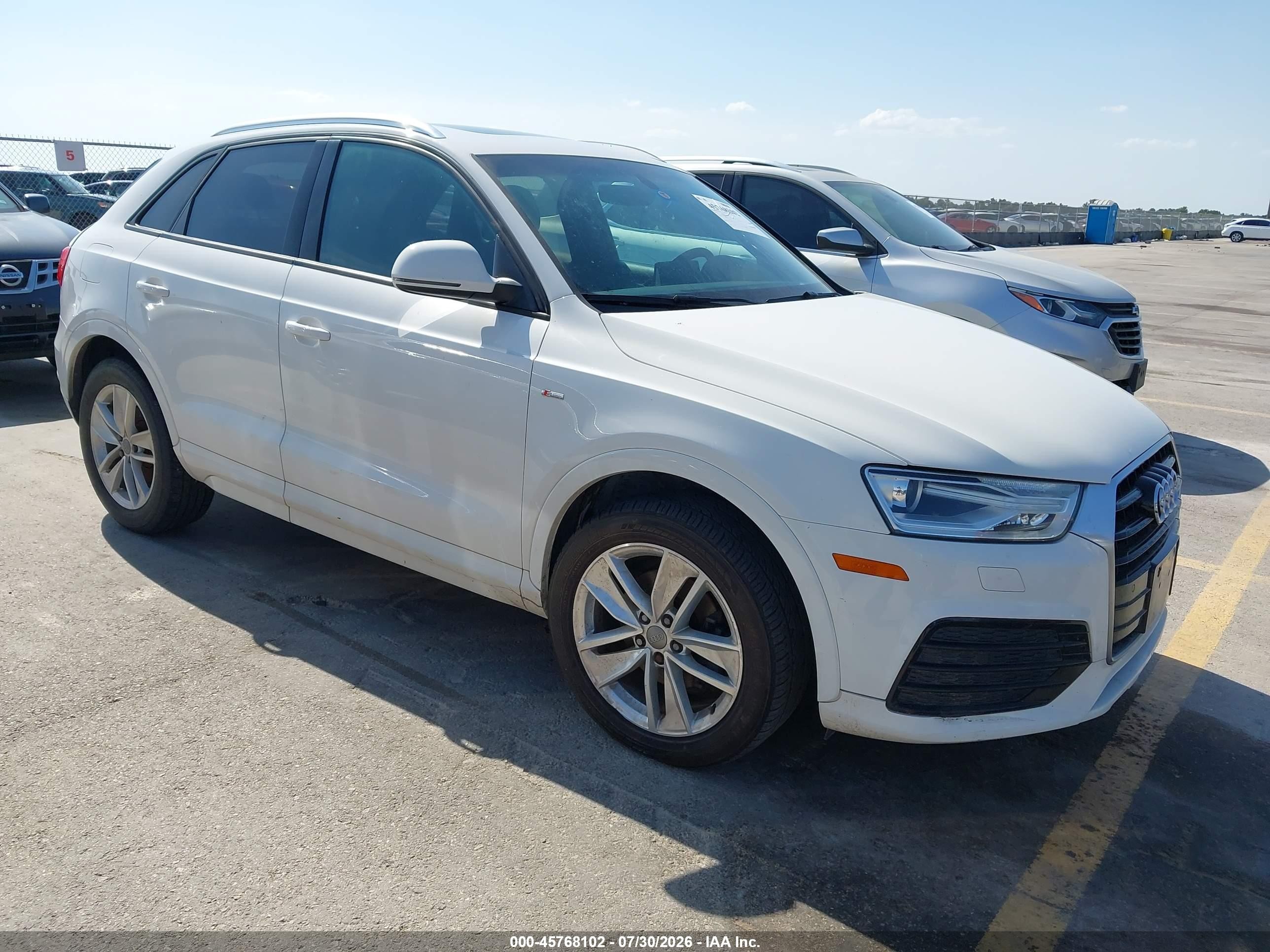 2018 Audi Q3 Premium, VIN WA1BCCFS8JR002774 — Normal wear
